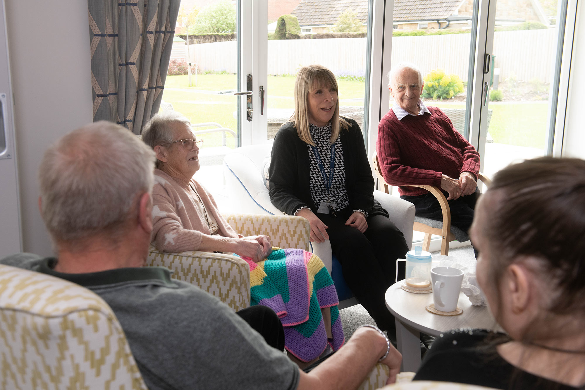 A group of people in an Extra Care setting