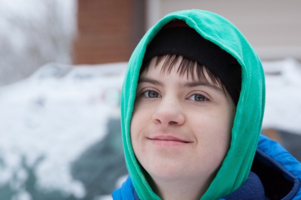 Boy in a green hooded top