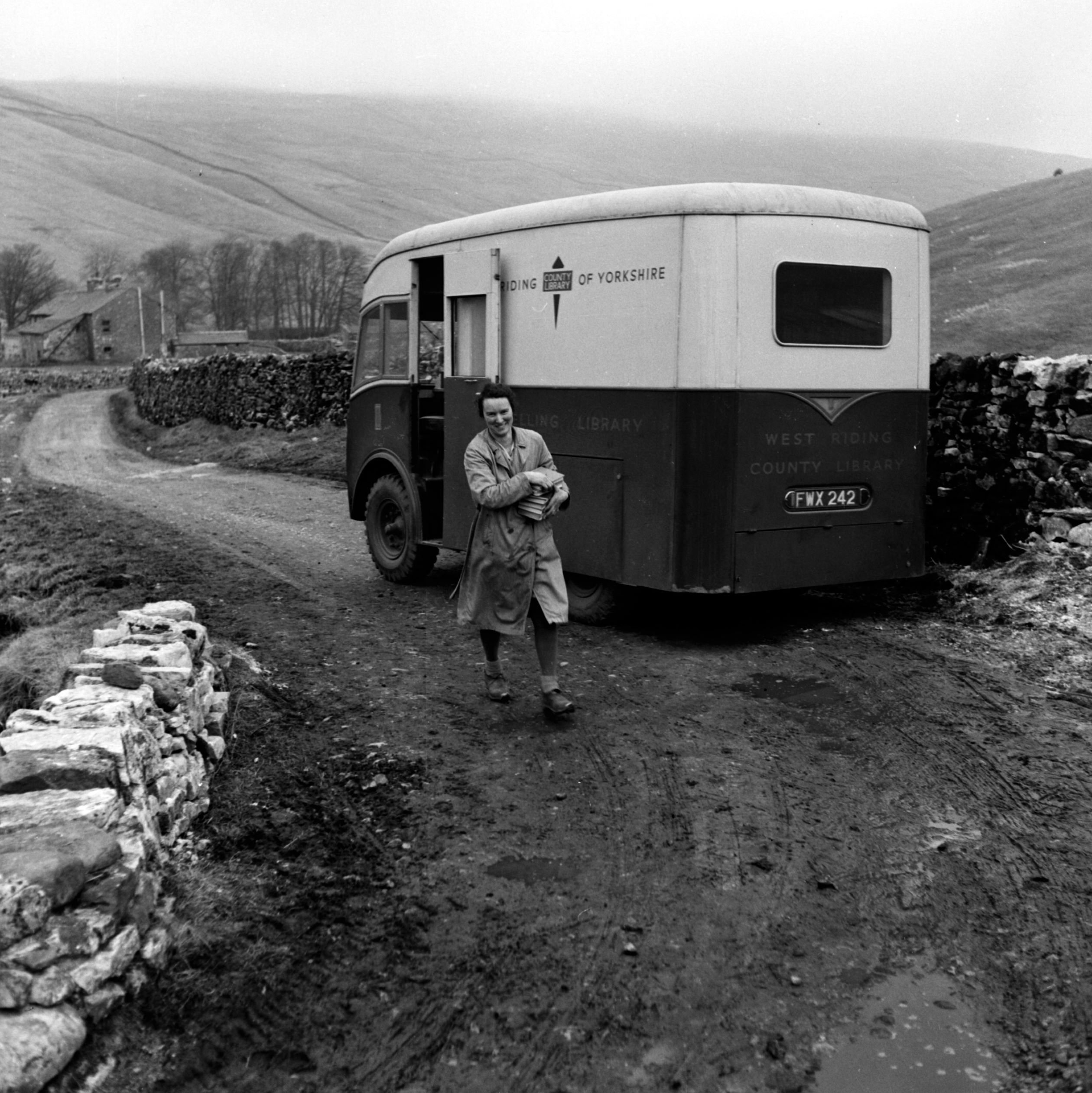 A mobile library visiting Foxup in Littondale in the 1950s, from the Bertram Unné photographic collection.