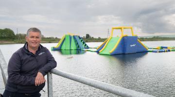 The North Yorkshire Water Park’s general manager, Gareth Davies, with inflatables from the attraction in the background