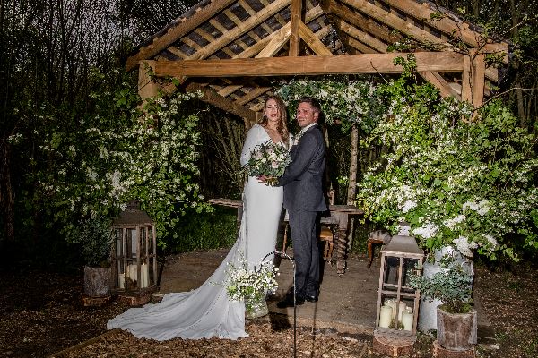 Bride and groom together surrounded by forestry. Bride and groom together surrounded by forestry.
