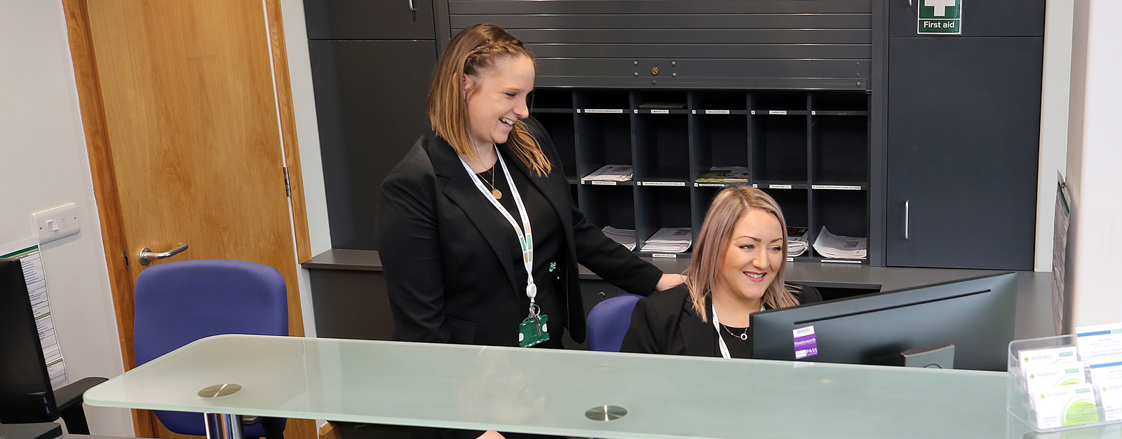 Support staff working in Evolution’s reception area.