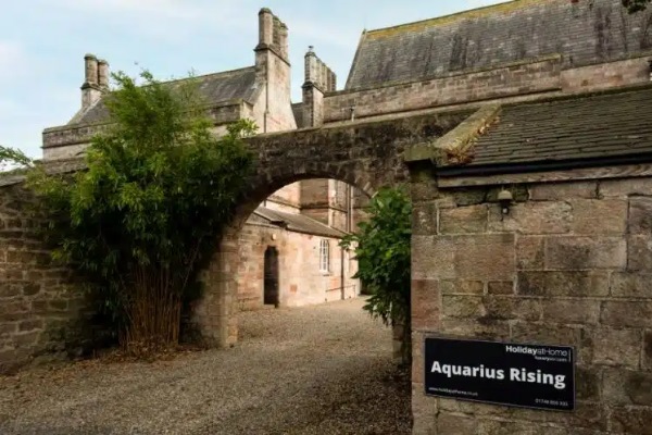 Outside the main gate of Aquarius Rising wedding venue. Outside the main gate of Aquarius Rising wedding venue.