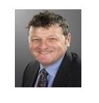 A portrait of Greg White, the Executive Member for Libraries.