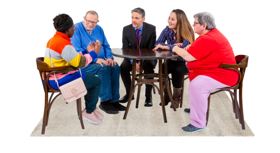 Five people sat round a table