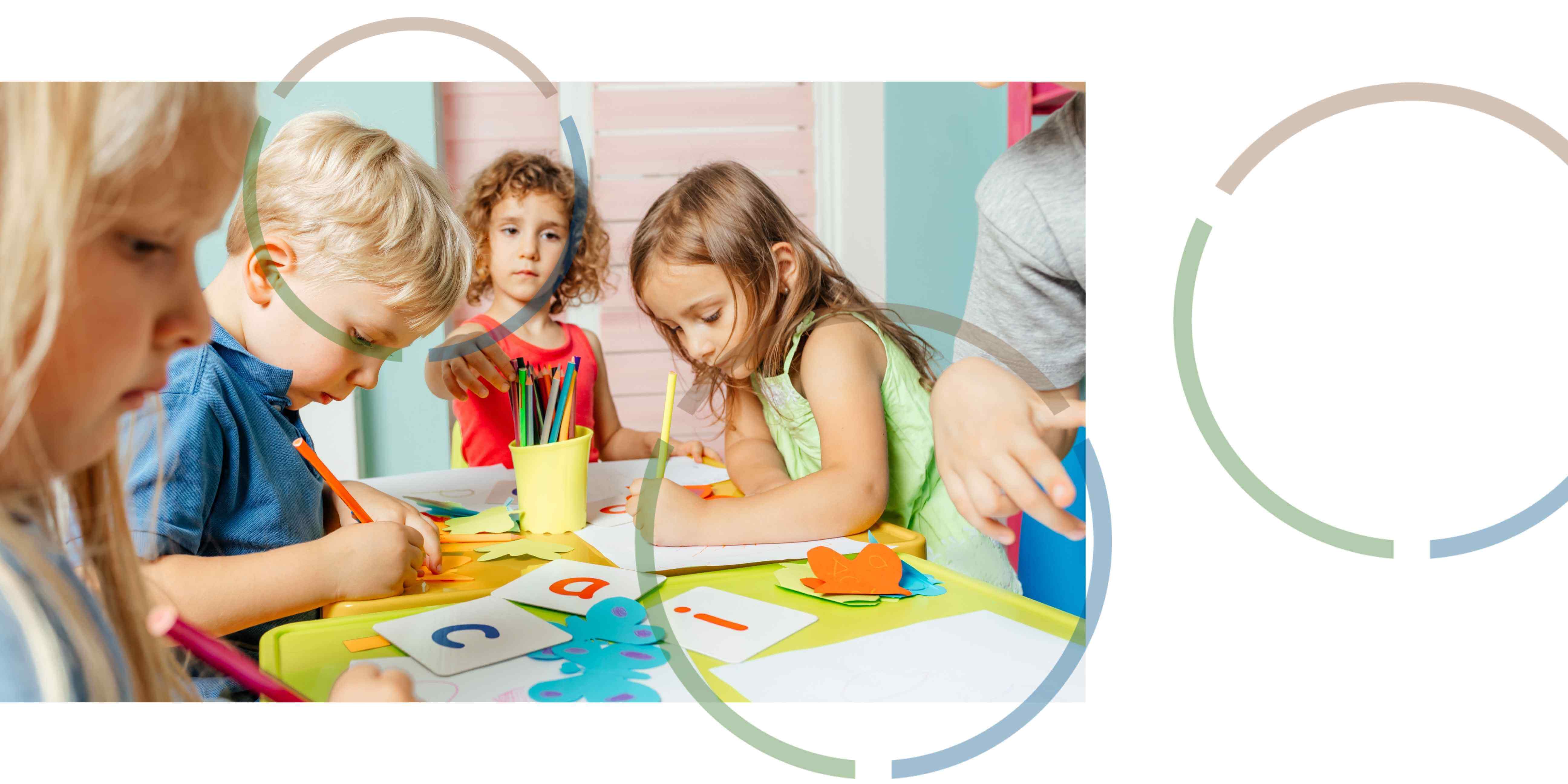 Children drawing with colourful pencils.