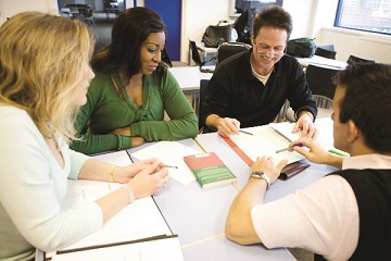 People working together at a table.
