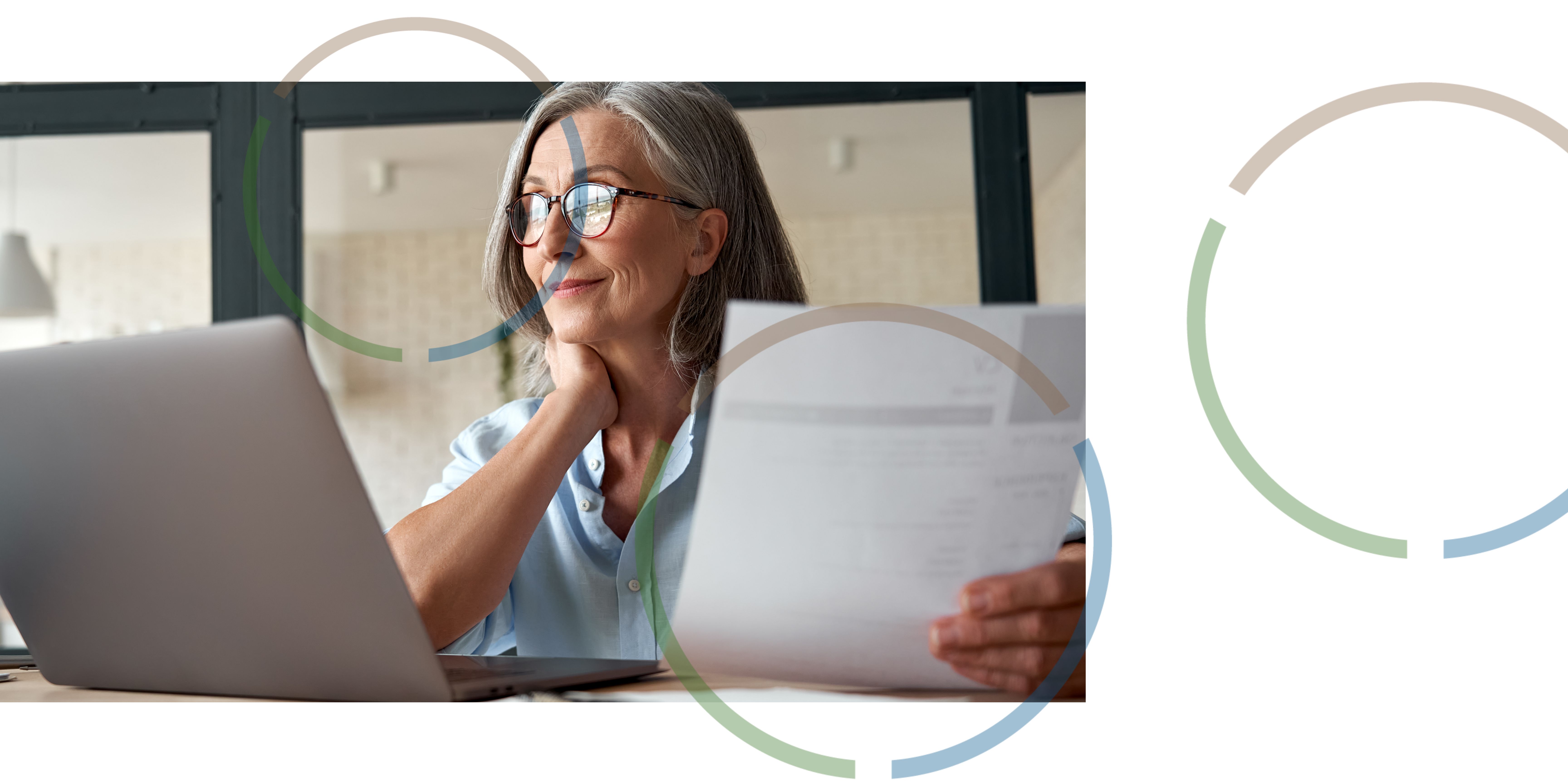 A woman working with a laptop.