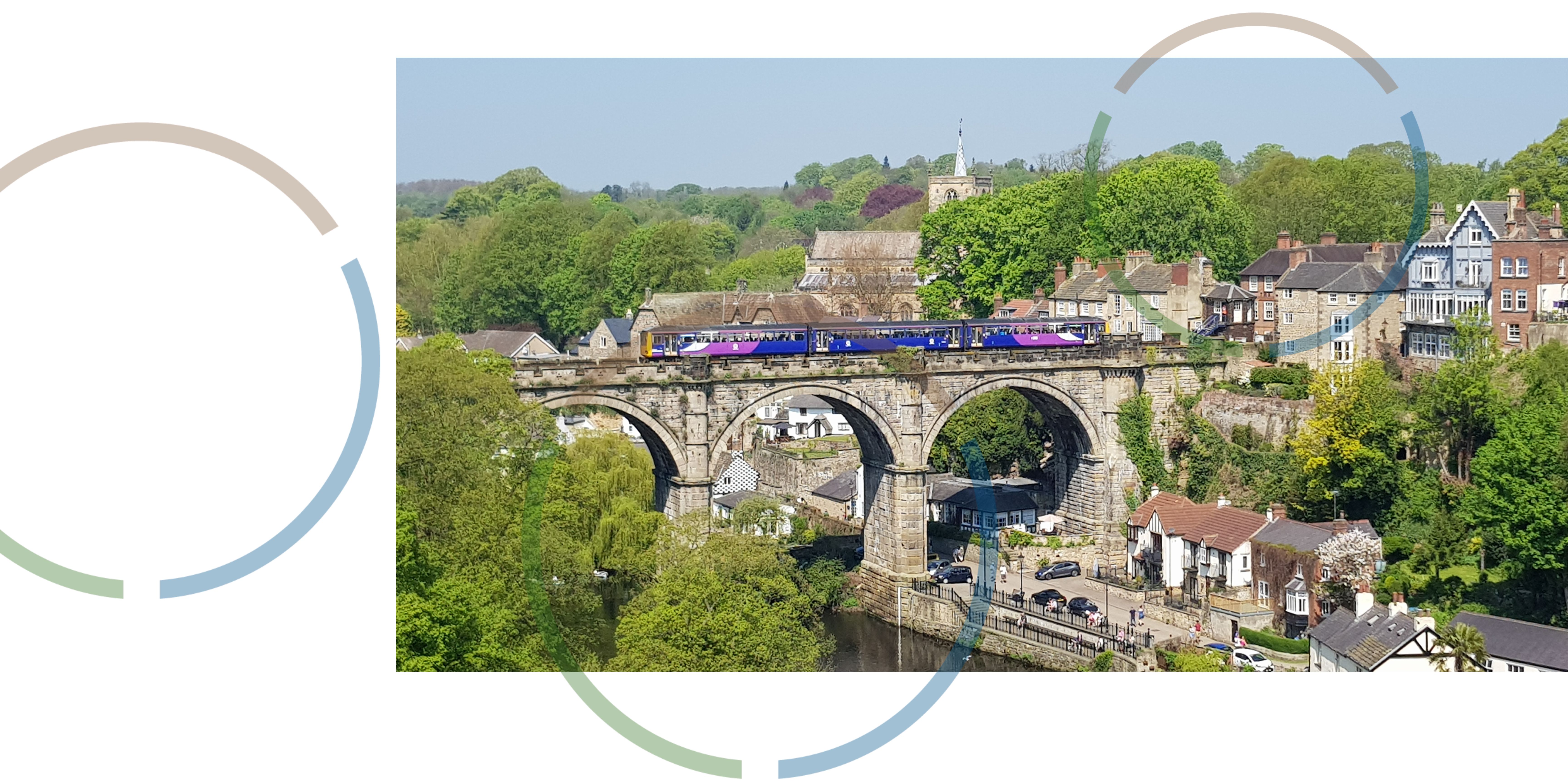 A train going over a viaduct.