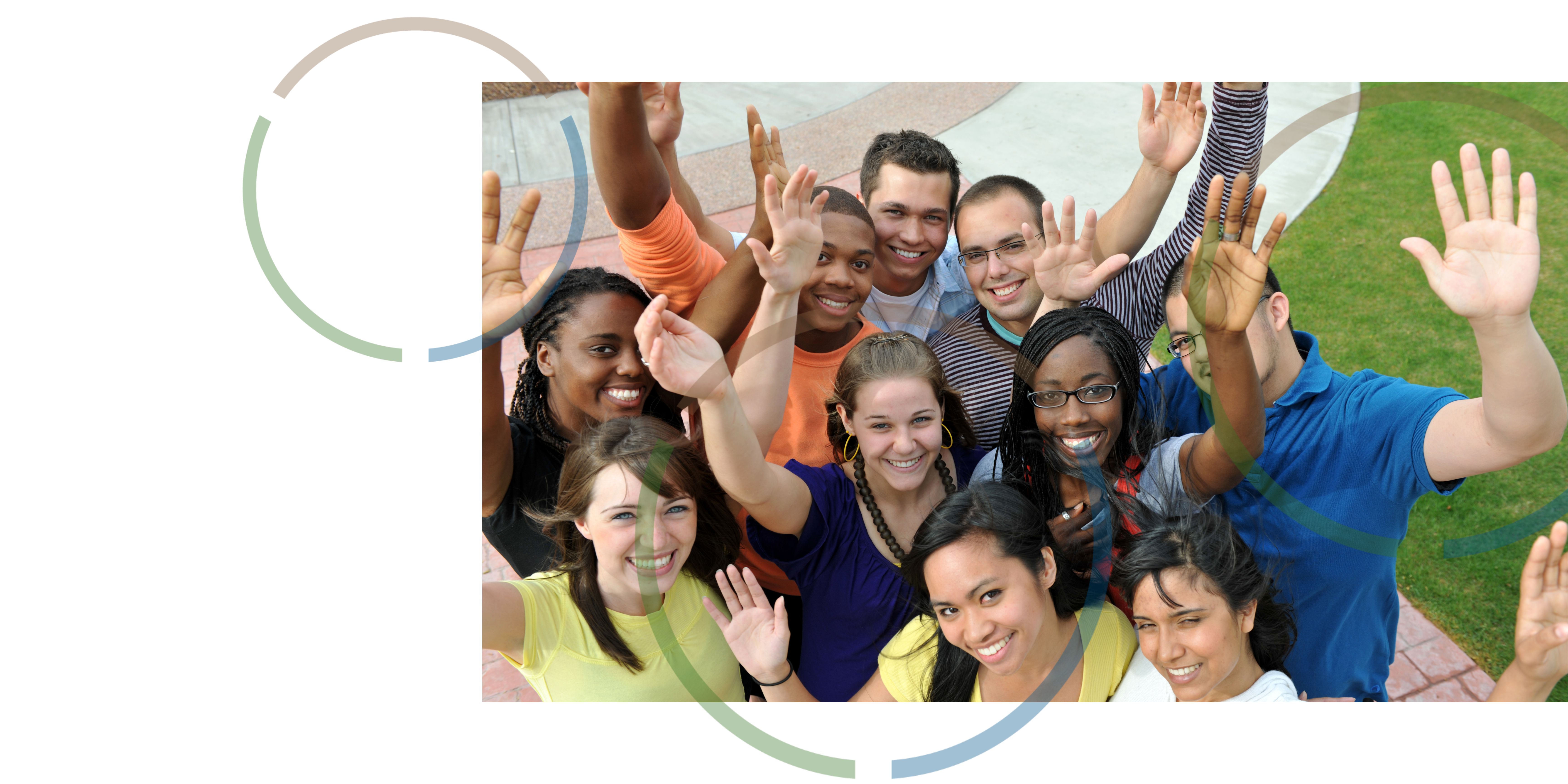 A group of people waving and smiling.