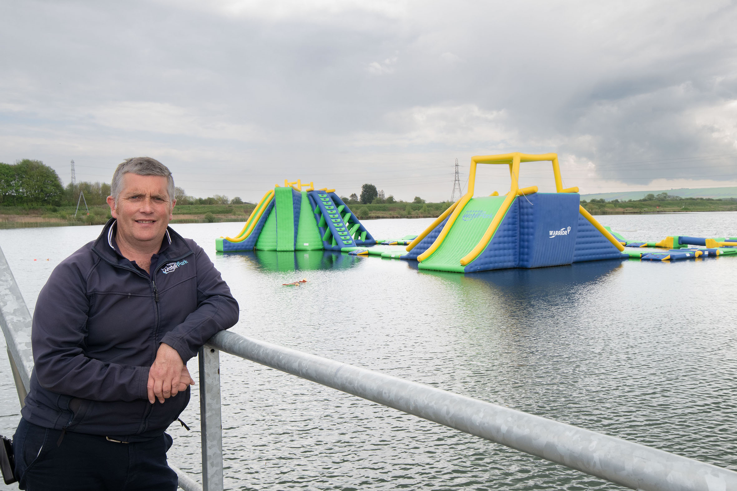 The North Yorkshire Water Park’s general manager, Gareth Davies, with inflatables from the attraction in the background