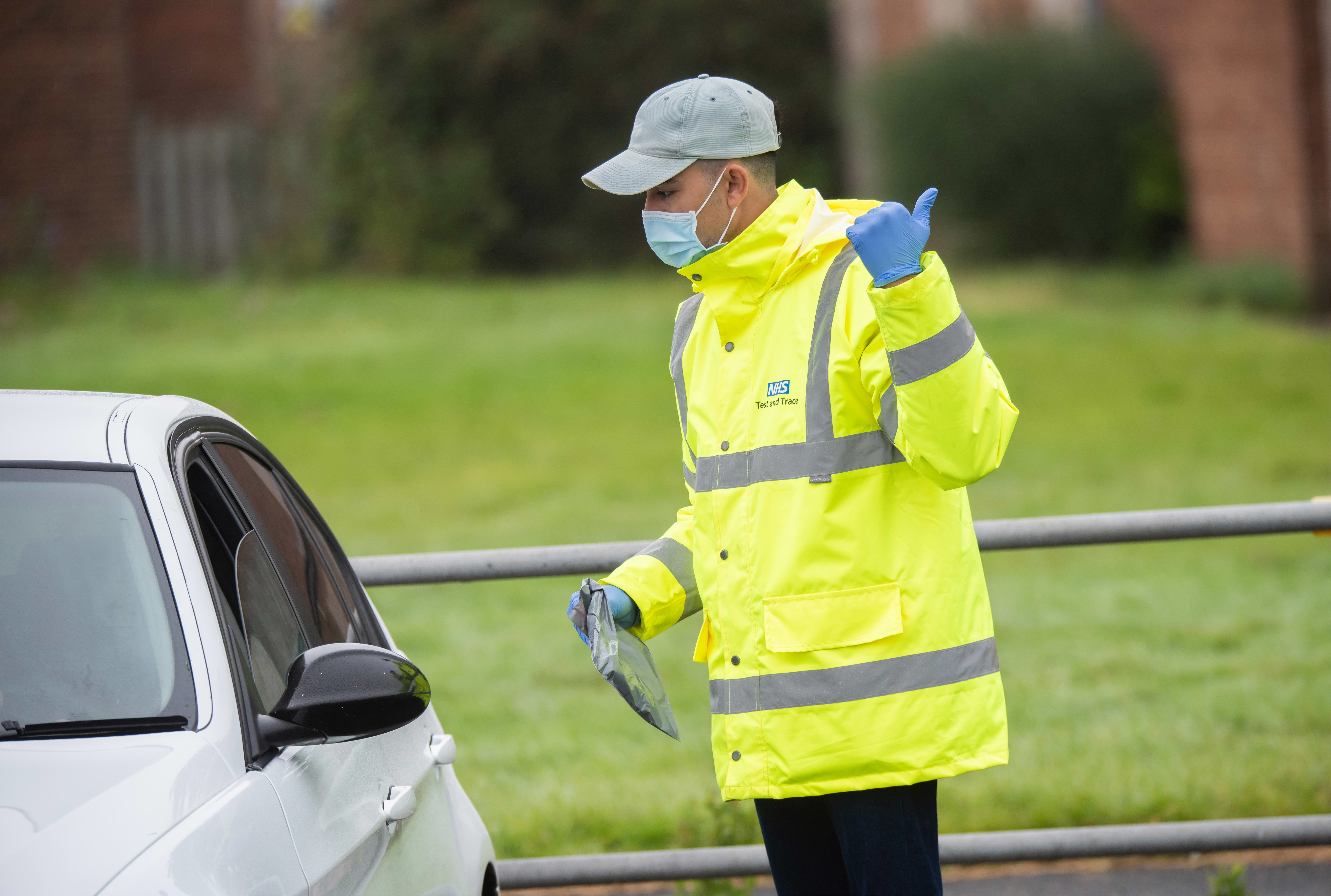 A volunteer at a COVID-19 testing centre during 2020.