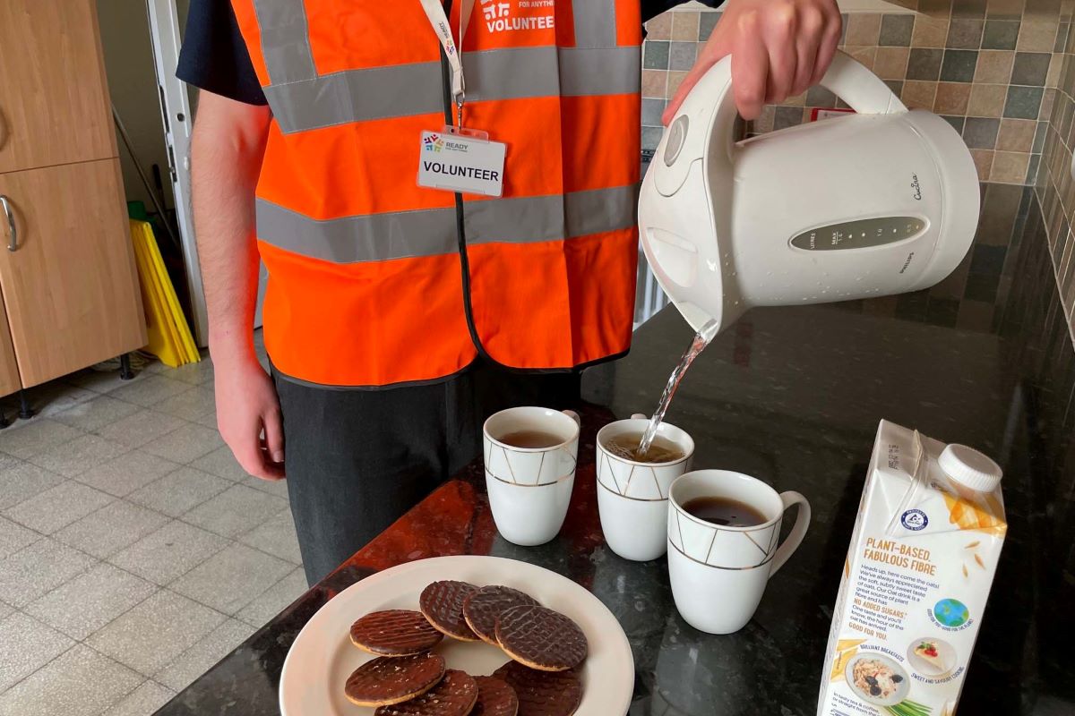 Volunteers making tea in a rest centre