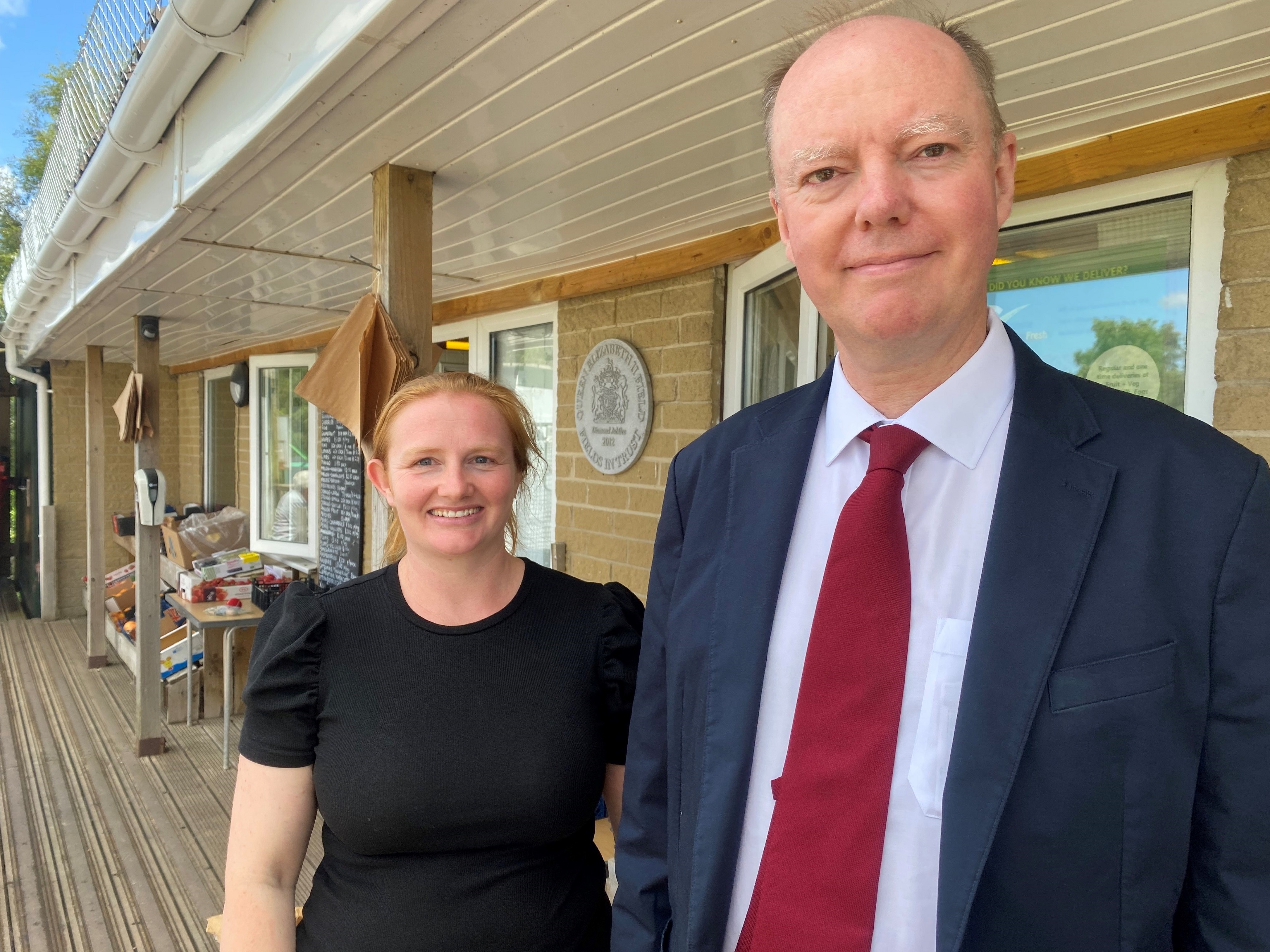 England’s Chief Medical Officer, Professor Chris Whitty, with Darley Village Shop’s manager, Dawn Abbott, outside the store 