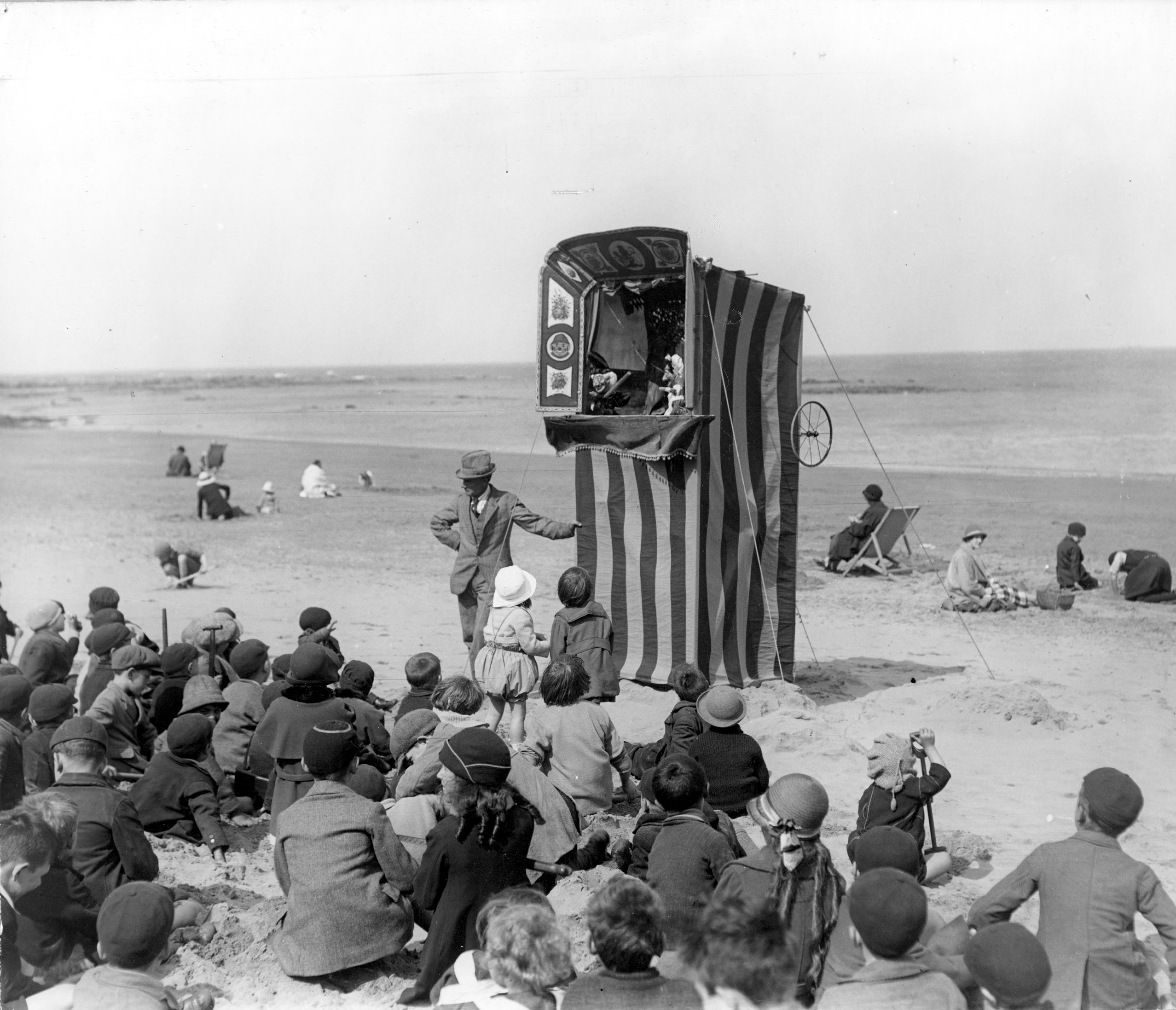 A Punch and Judy show at Scarborough during the Edwardian period.