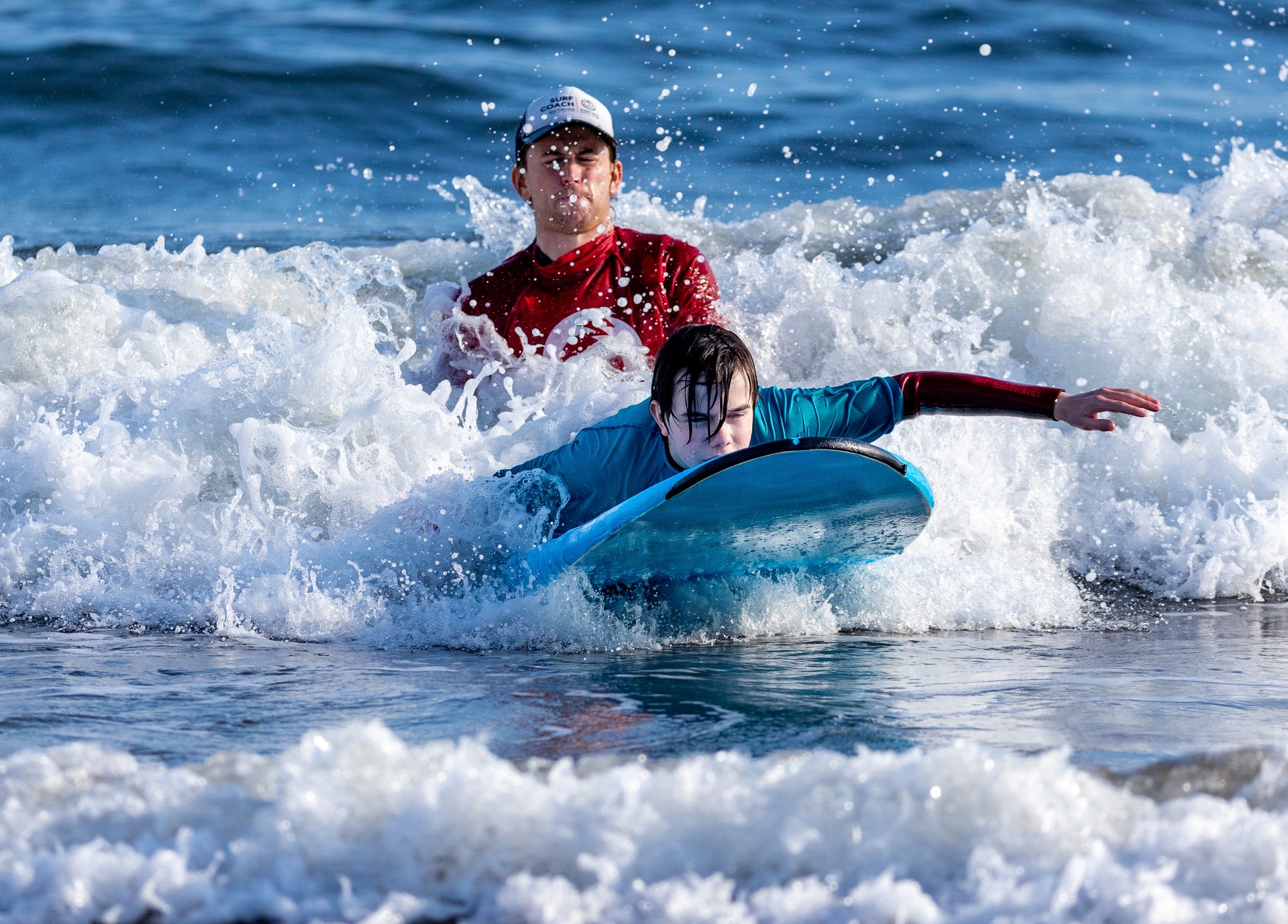 Two people on surf boards