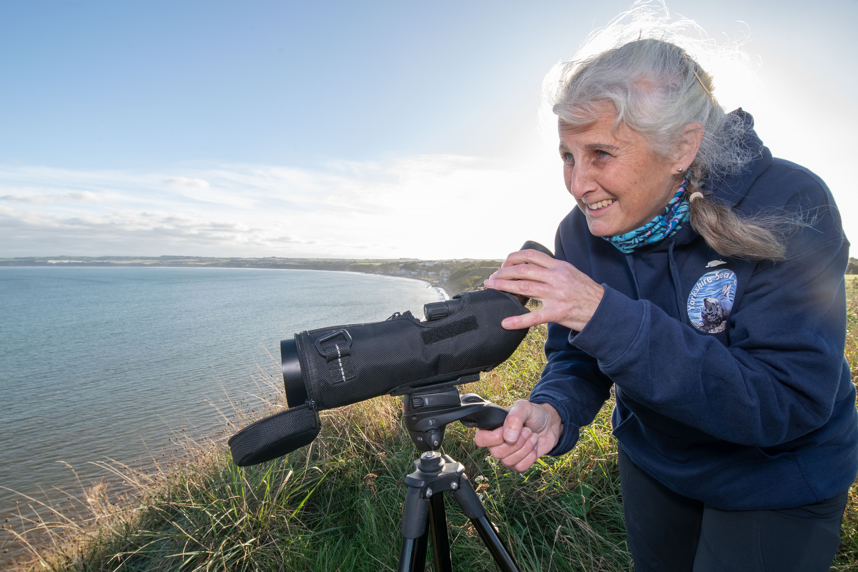 Audrey McGhie looking out for seals on the North Yorkshire coast. 