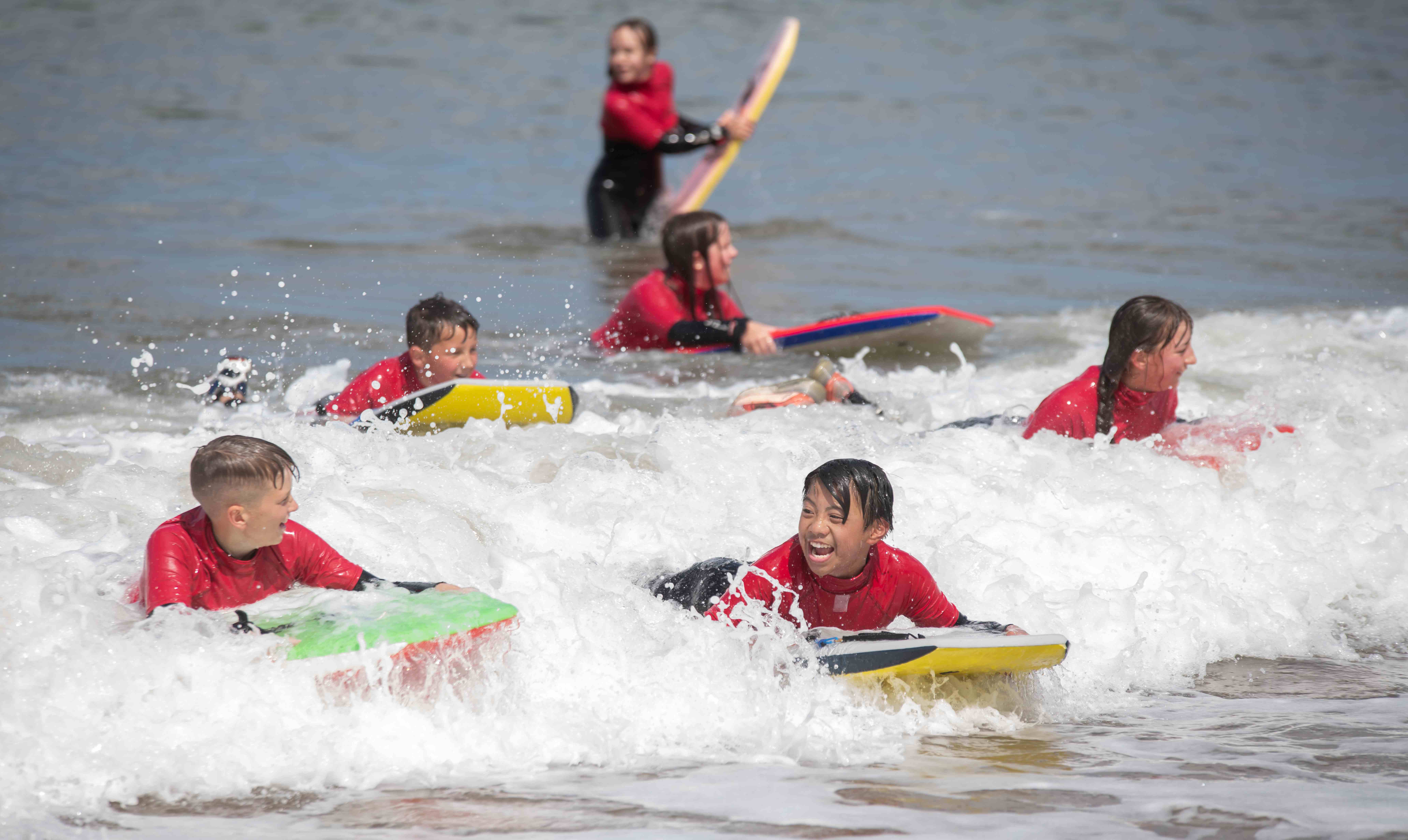 Children on surf boards