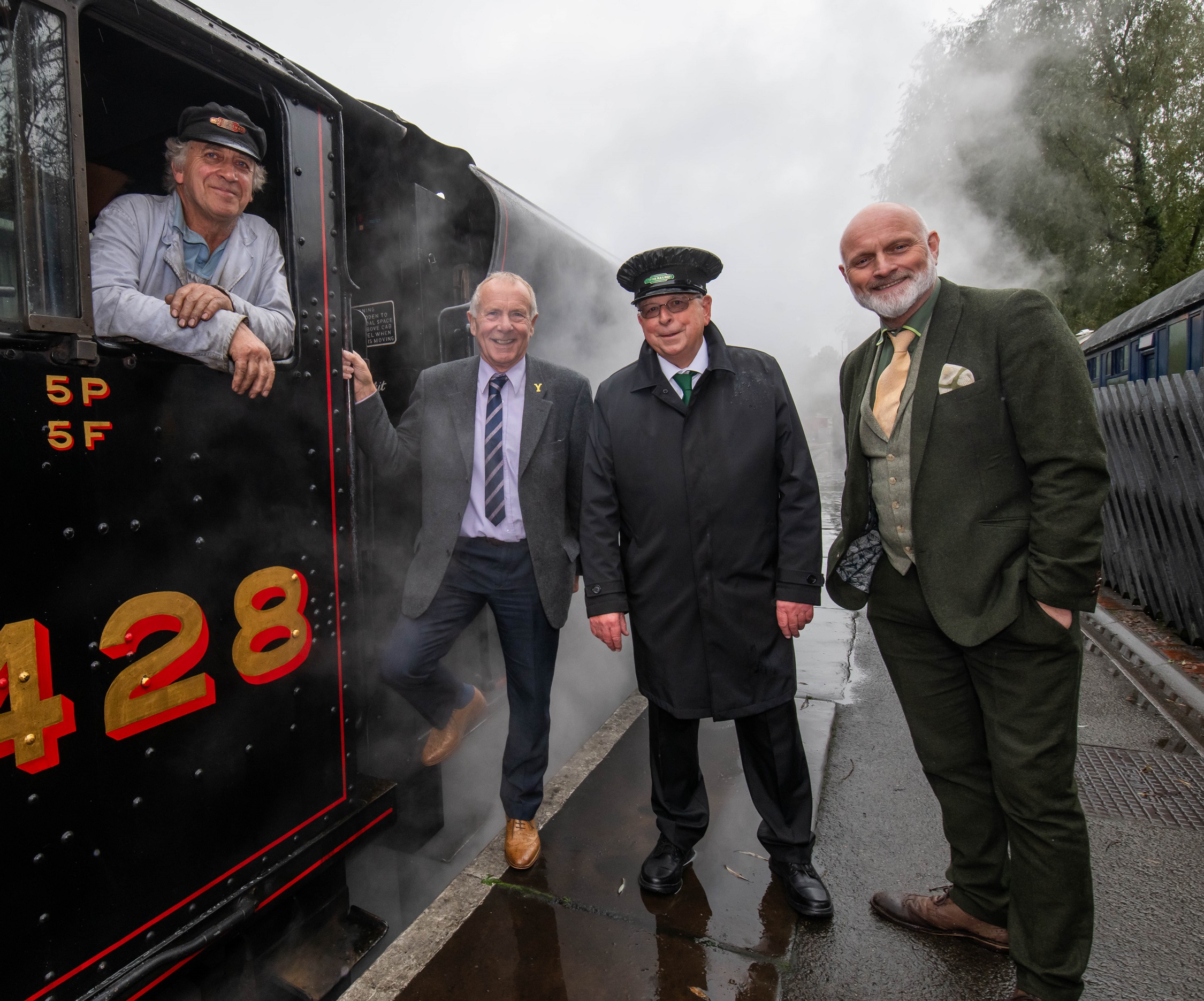 : From left, train driver Adrian Landi, North Yorkshire Council’s executive member for the visitor economy, Cllr Derek Bastiman, station staff Allan Langham, and VisitEngland’s director, Andrew Stokes, pictured at the North Yorkshire Moors Railway’s station in Pickering. 