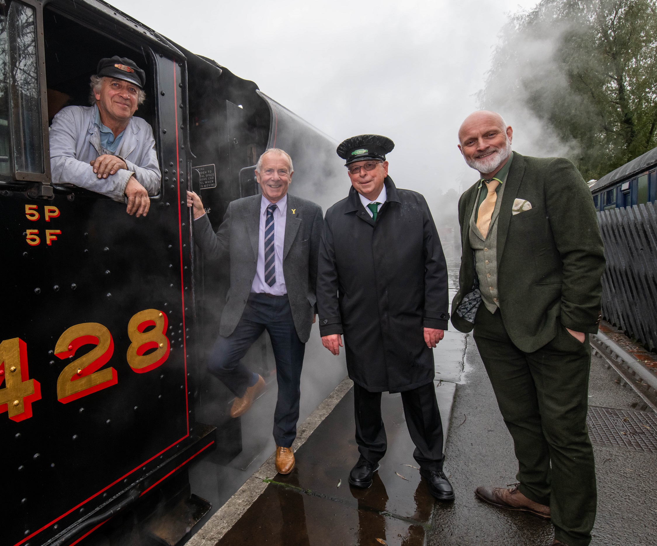 : From left, train driver Adrian Landi, North Yorkshire Council’s executive member for the visitor economy, Cllr Derek Bastiman, station staff Allan Langham, and VisitEngland’s director, Andrew Stokes, pictured at the North Yorkshire Moors Railway’s station in Pickering.