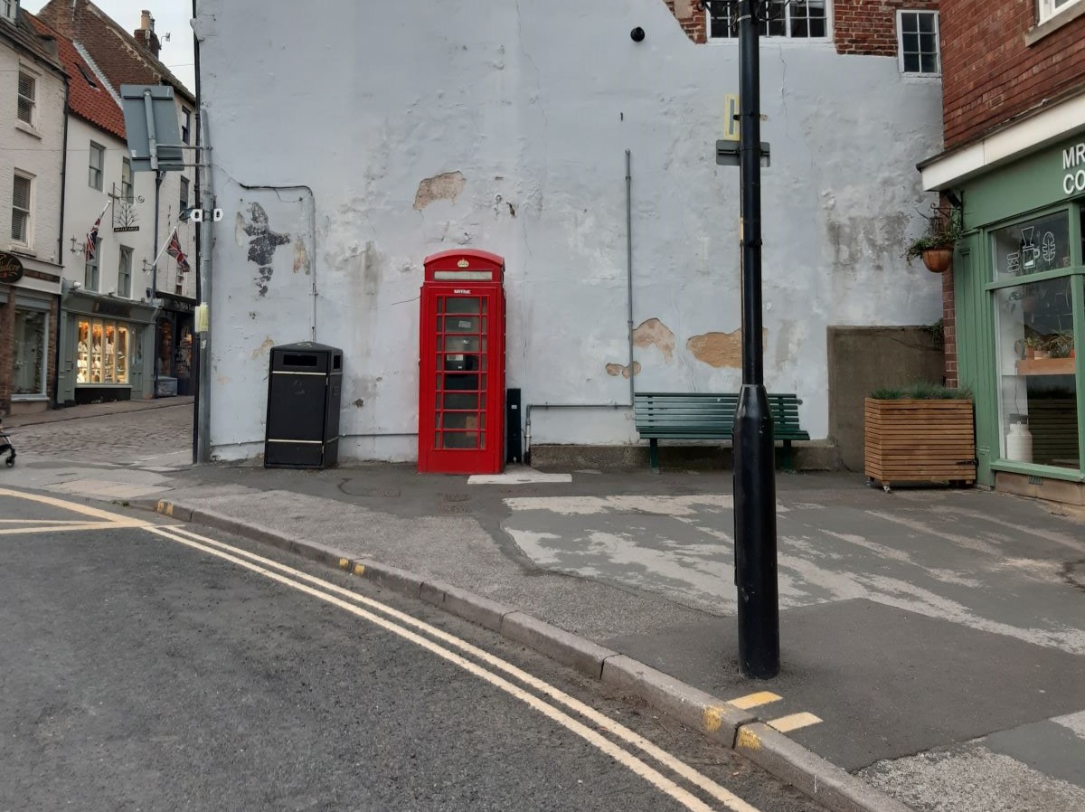 The pavement space where Bridge Street meets Church Street, Whitby.