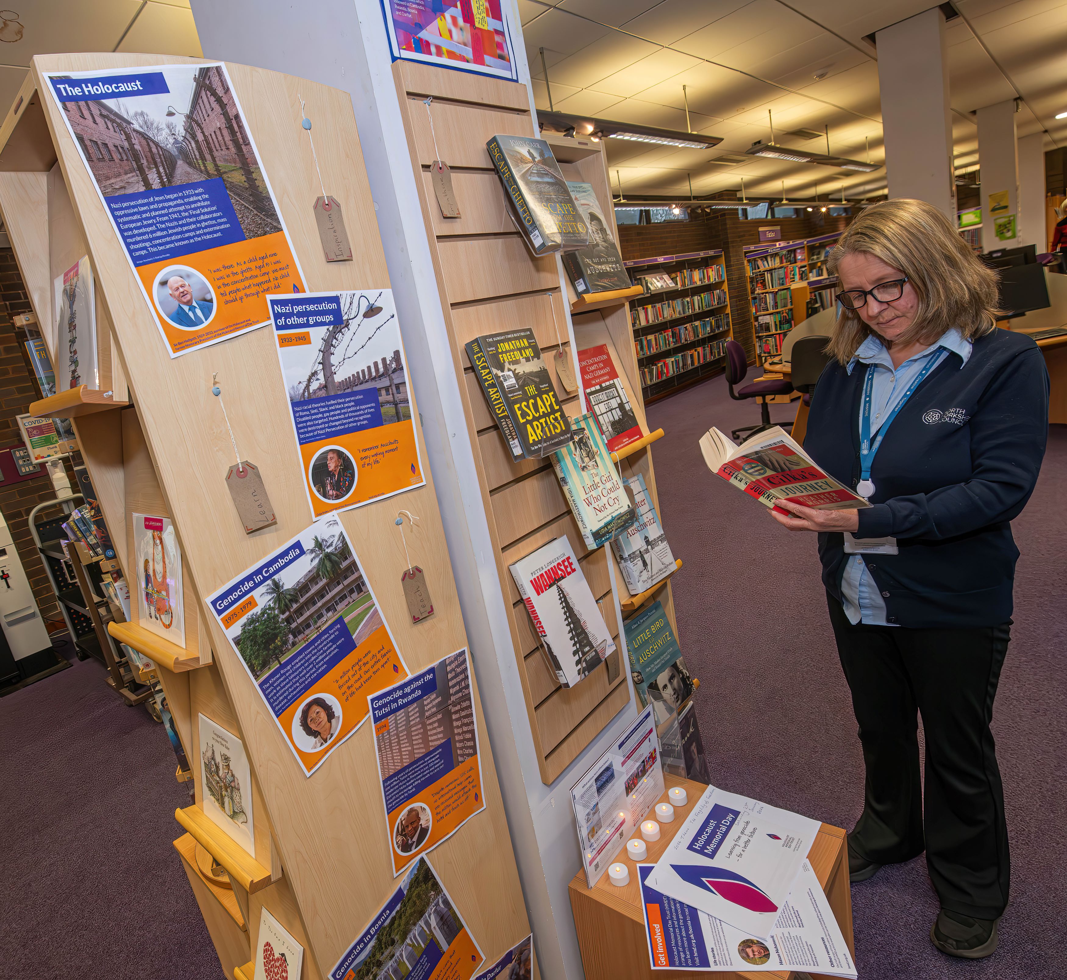 North Yorkshire libraries’ library assistant, Jo Madgwick, looks over the Holocaust Memorial Day display at Northallerton Library