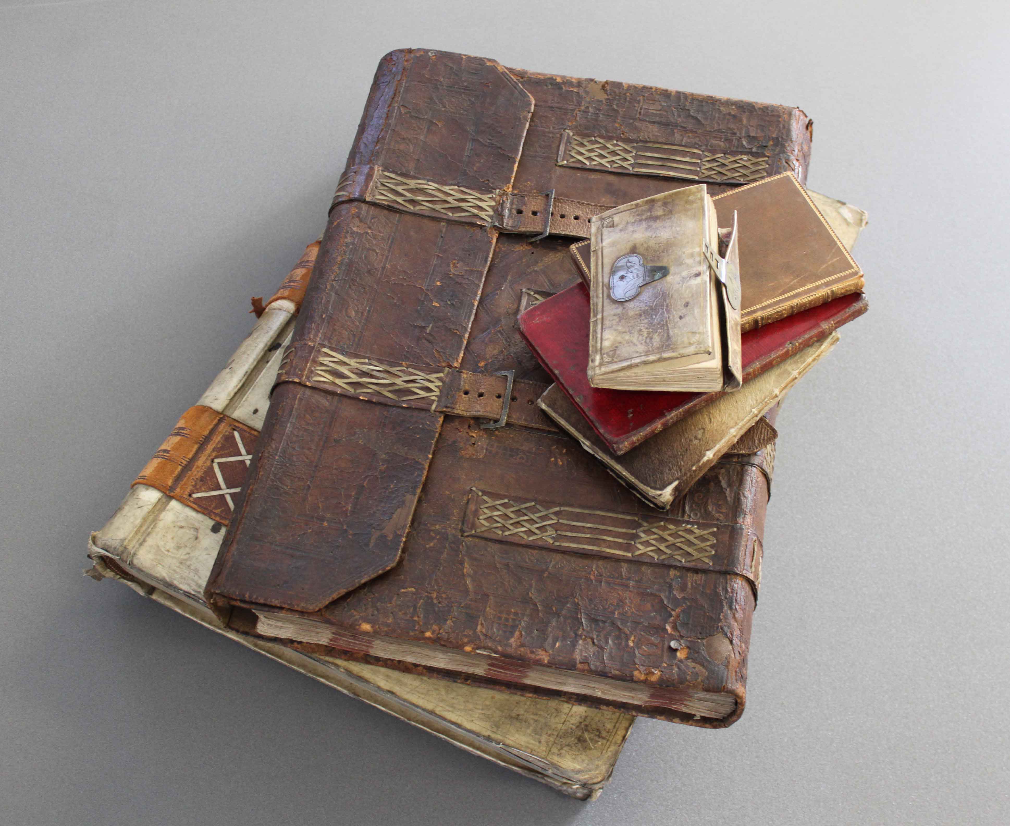 Photo showing an example of stump-work bookbinding (no date), from a historic photographic collection in the Bertram Unné collection.