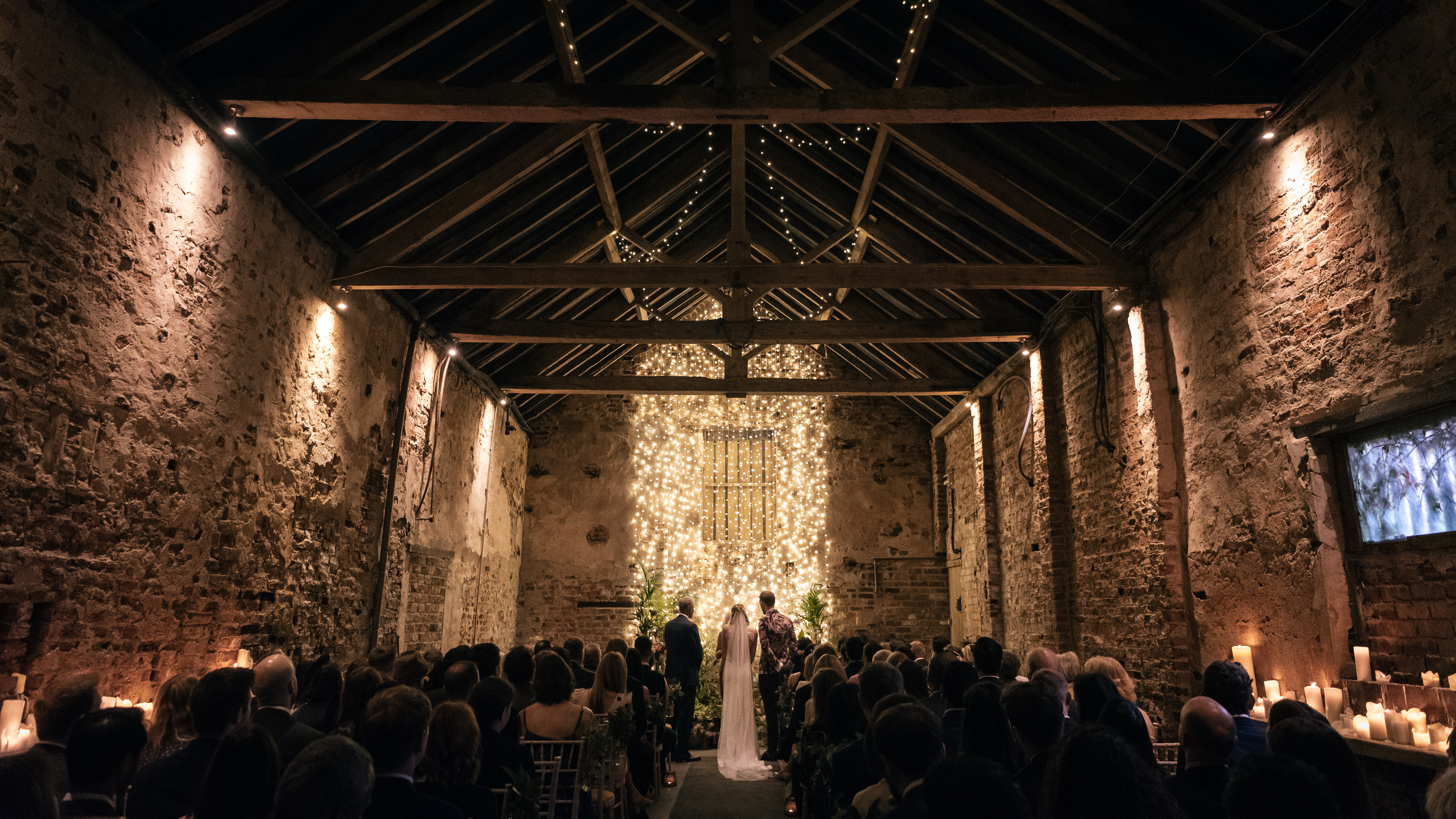 A wedding ceremony happening in a converted old building.
