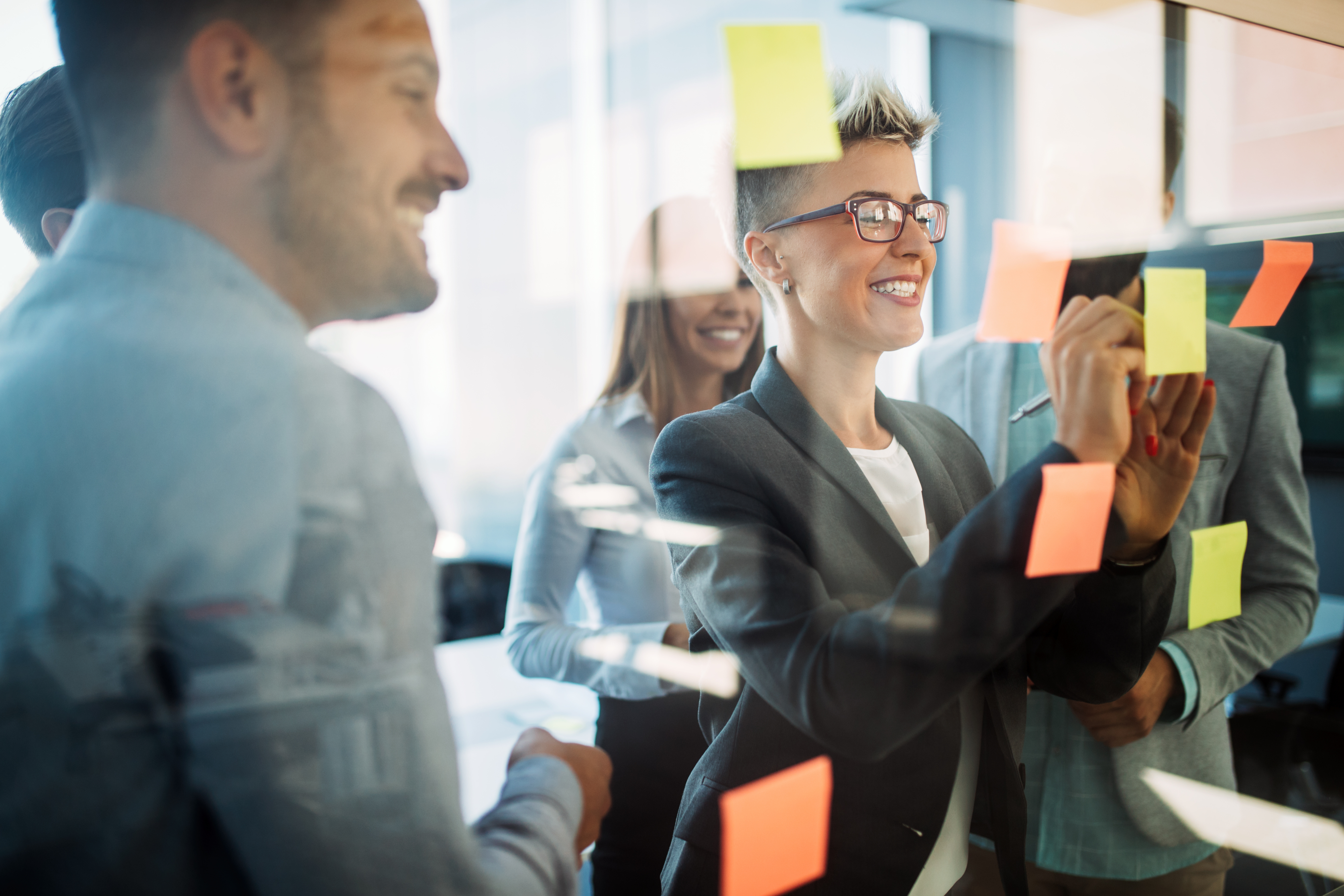 A group of people working together on a business plan.