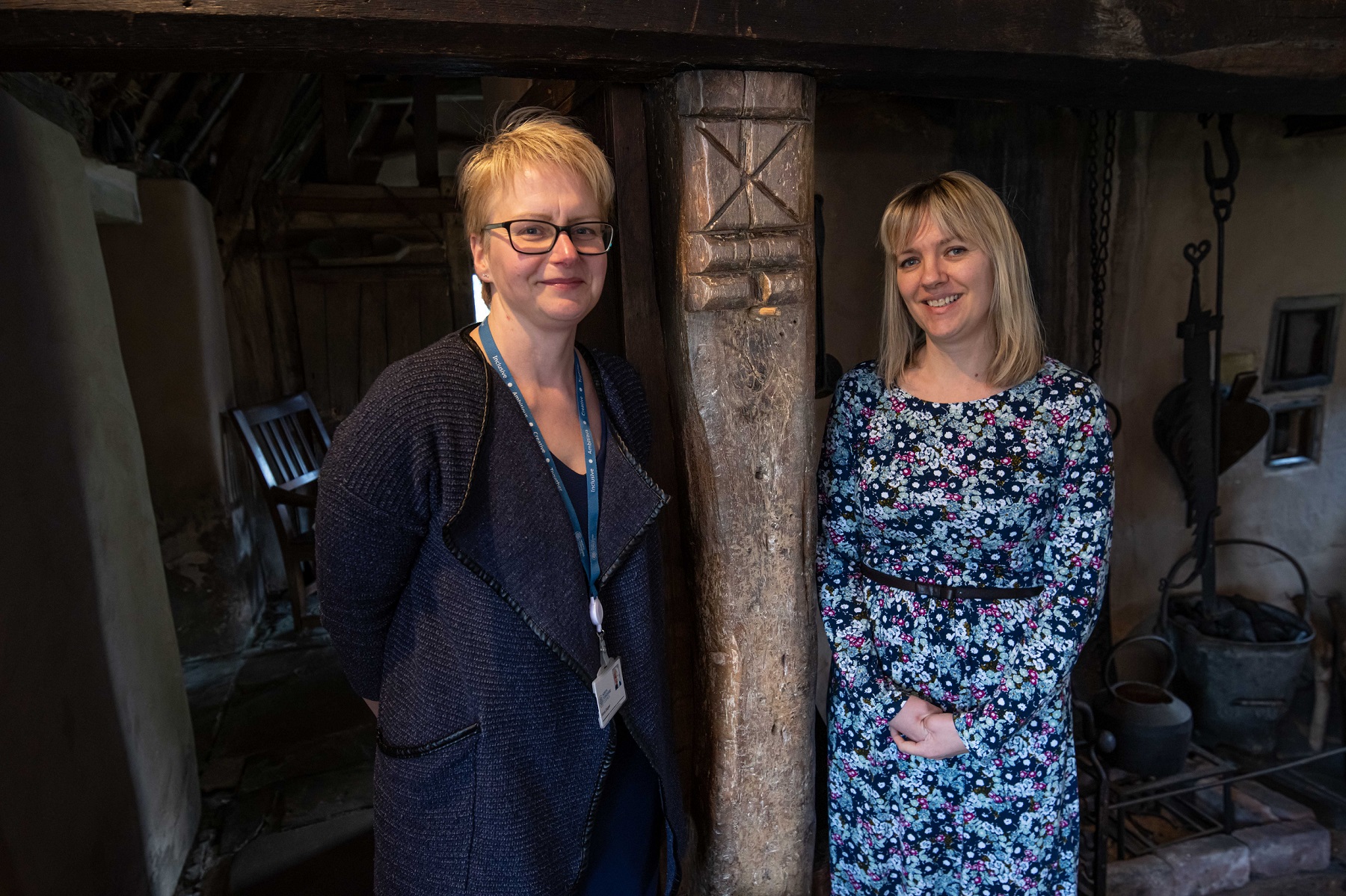 Outreach librarian at North Yorkshire Council, Fiona Diaper (left), and marketing and events co-ordinator at Ryedale Folk Museum, Rosie Barrett, next to a witch post at the museum. 