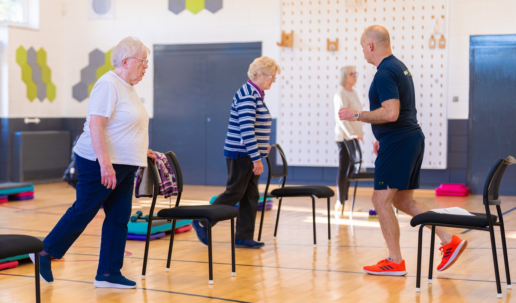 A group of women taking part in a balance class at Fairfax Community Hub
