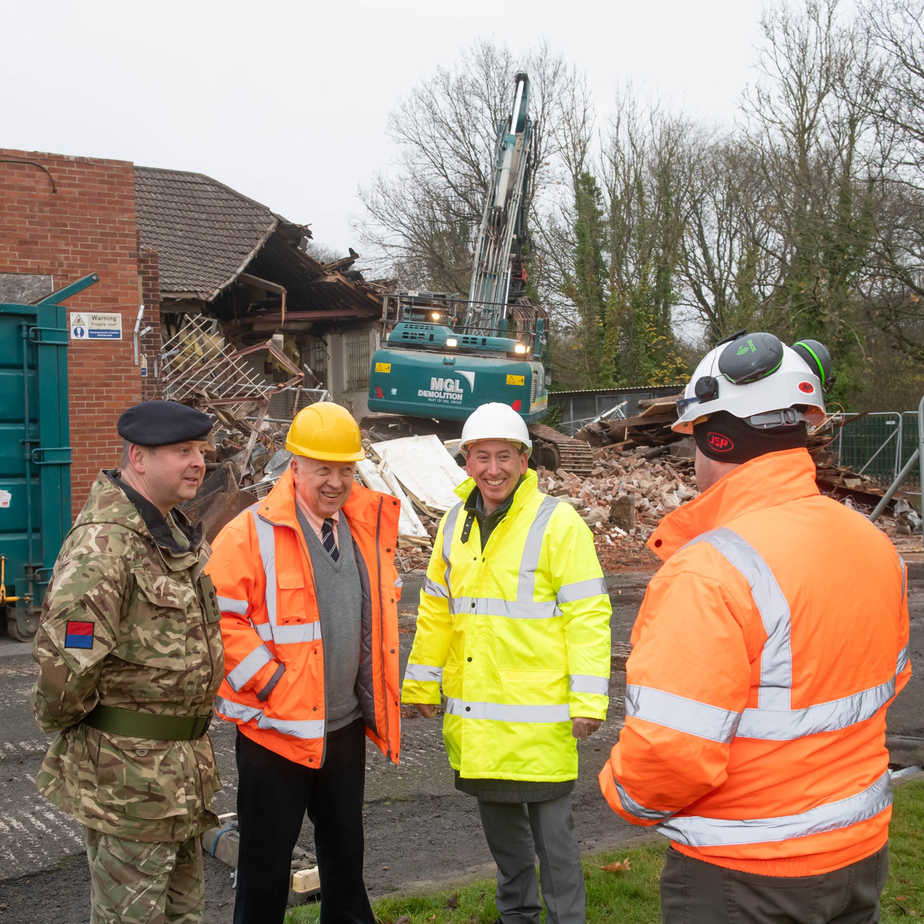 Catterick Garrison’s commander, Lt Col Charlie Anderson RA, North Yorkshire Council’s leader, Cllr Carl Les, and James Roy, the project lead from the Defence Infrastructure Organisation (DIO), discuss progress at Shute Road with Jason Lowes, senior estates development manager for the Defence Infrastructure Organisation.