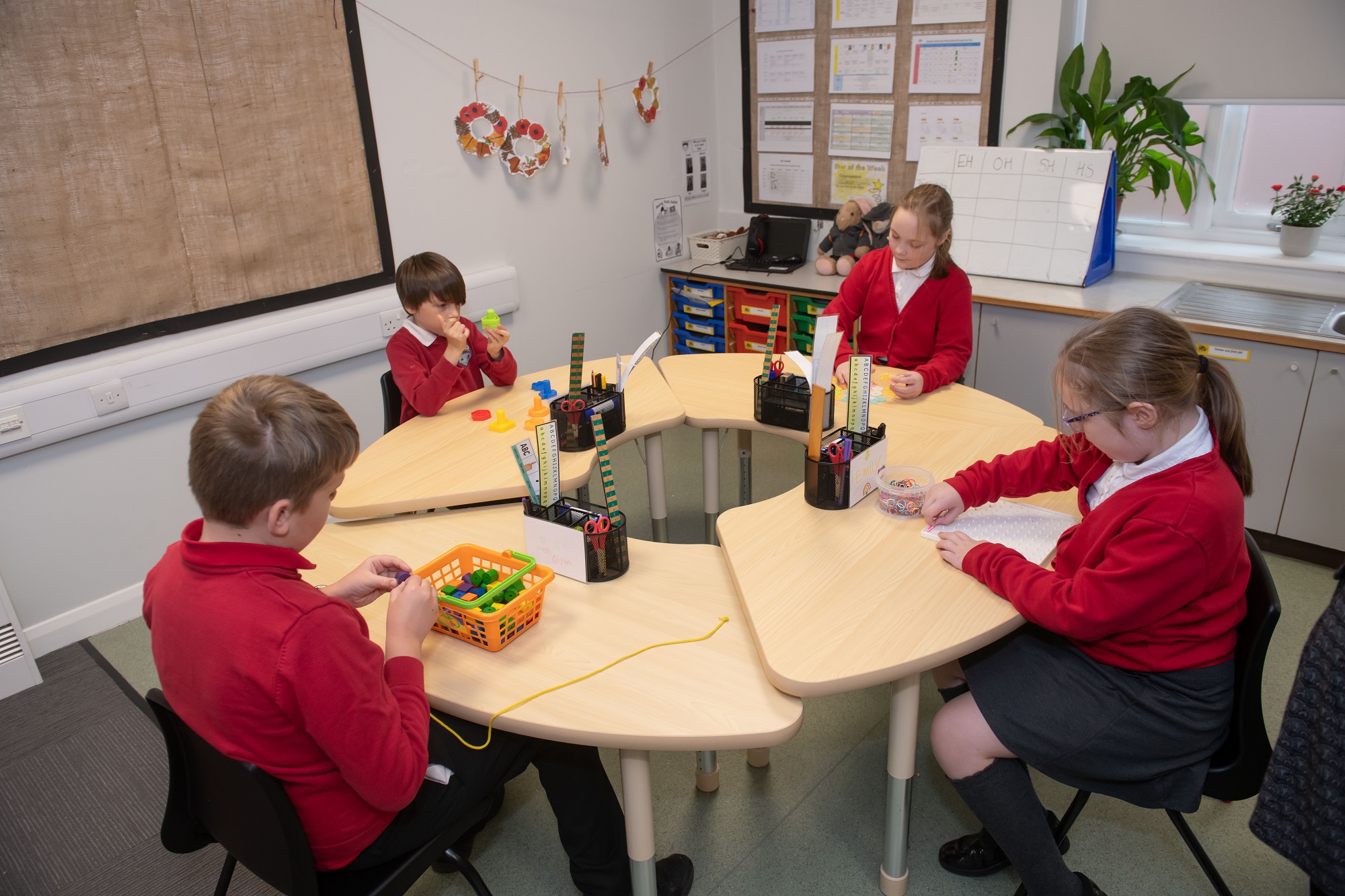 Four children around a table