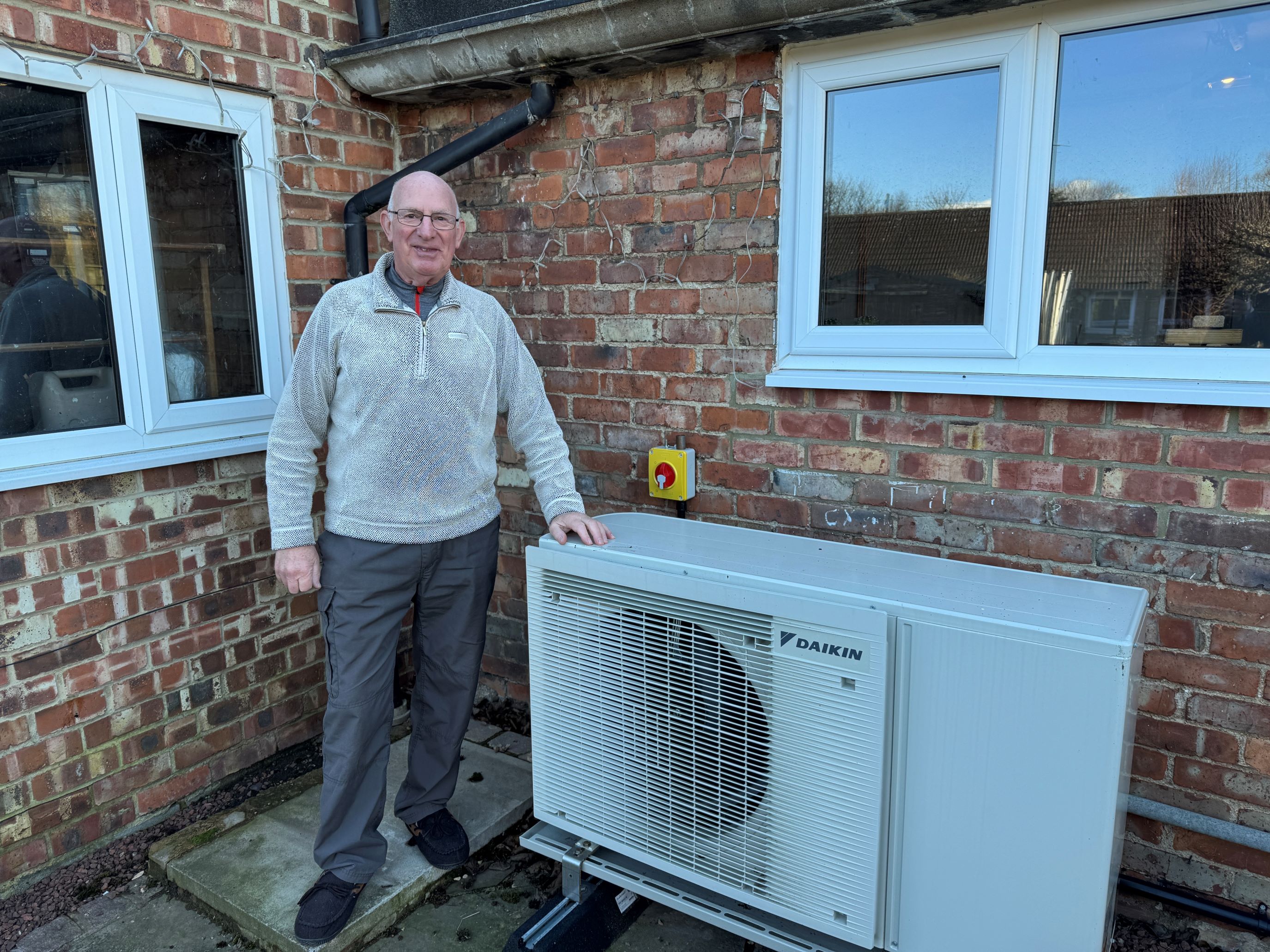 Kirkby Fleetham resident David Fielding with a heat pump