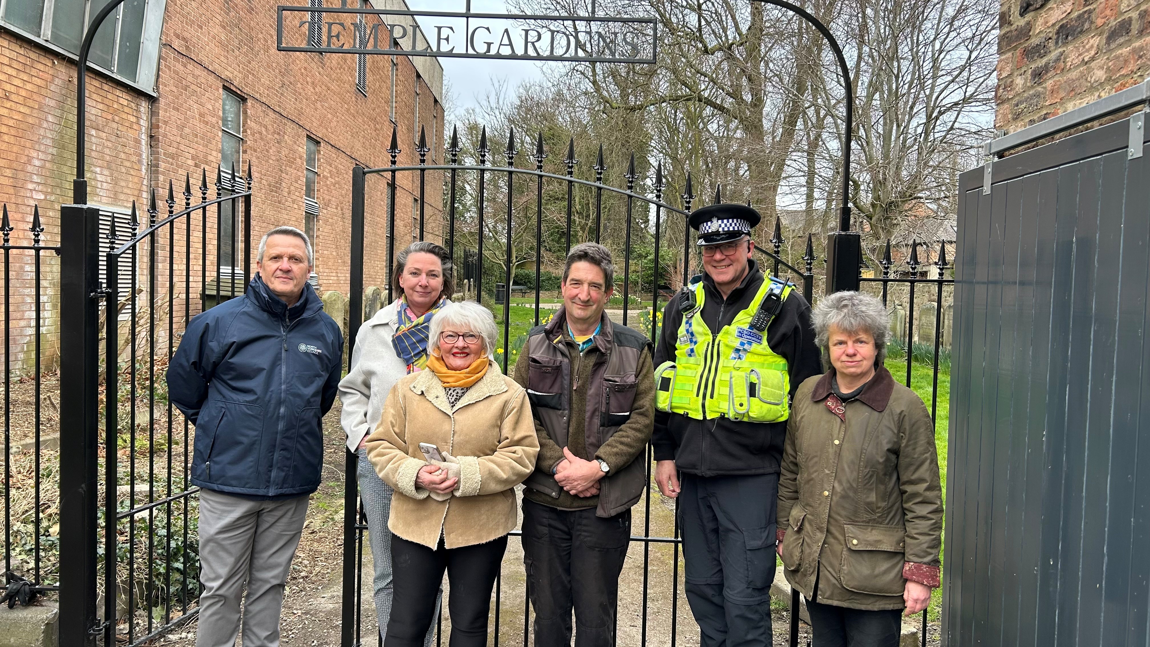 Group of people in Temple Gardens in Ripon
