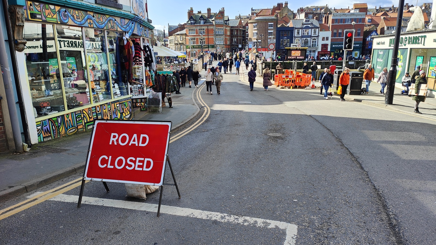 A road closed sign next to Whitby Swing Bridge