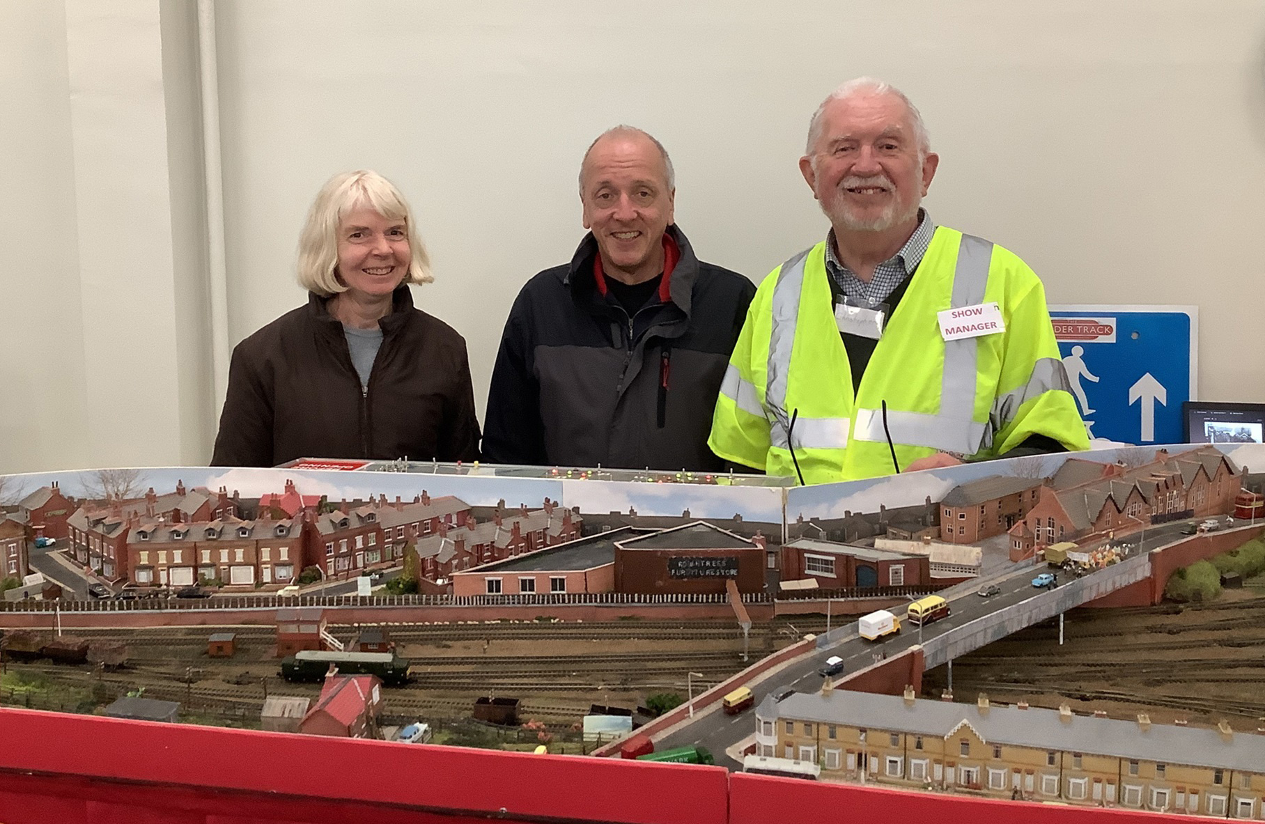 • A couple from Switzerland who flew in to see the Last Train to Whitby exhibition, with show manager Chris Martin.