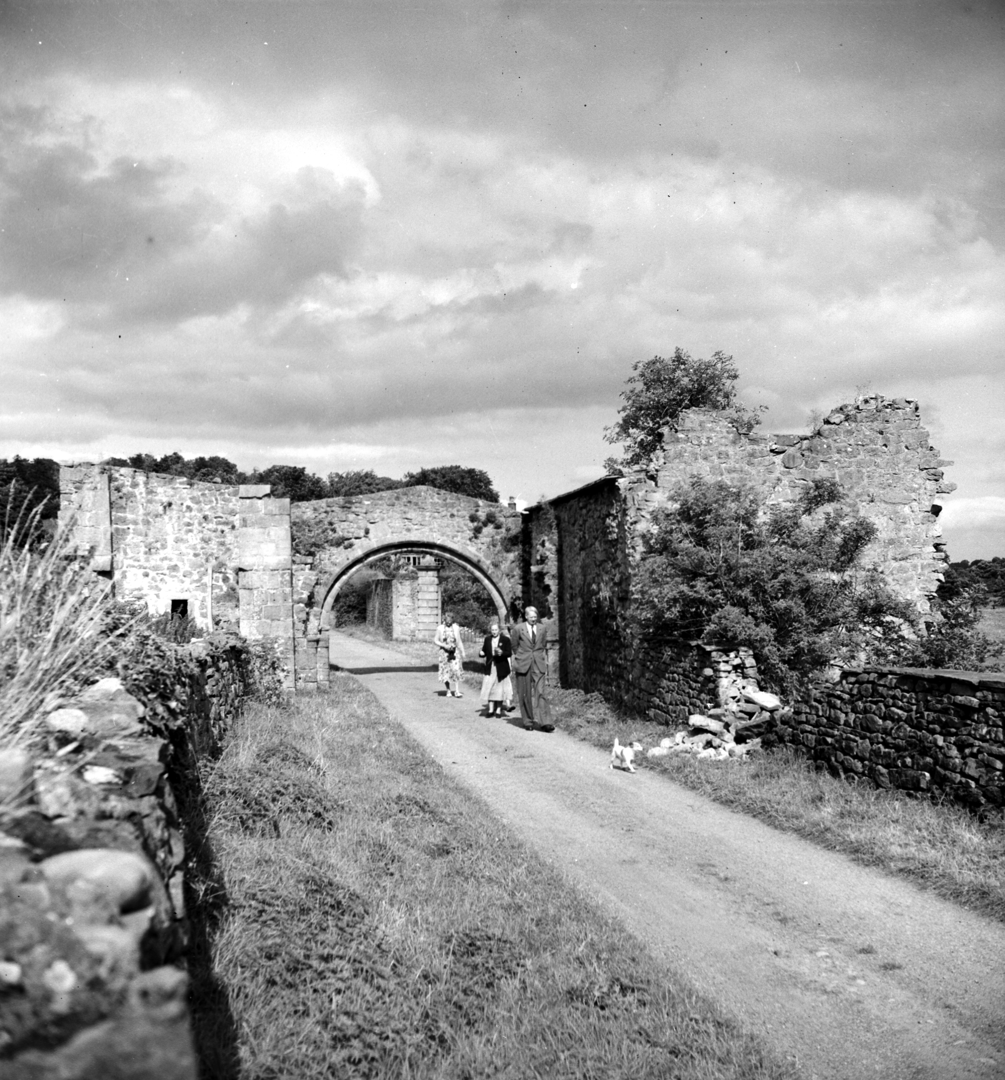 Strolling through the ruins at Coverham Abbey