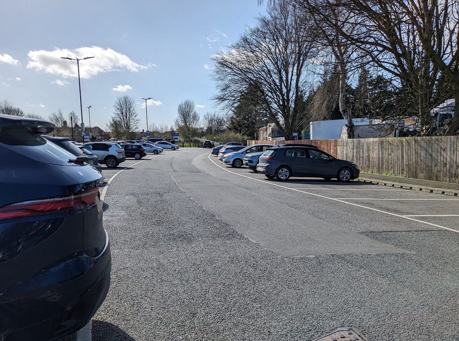 Cars parking in parking spaces in a car park