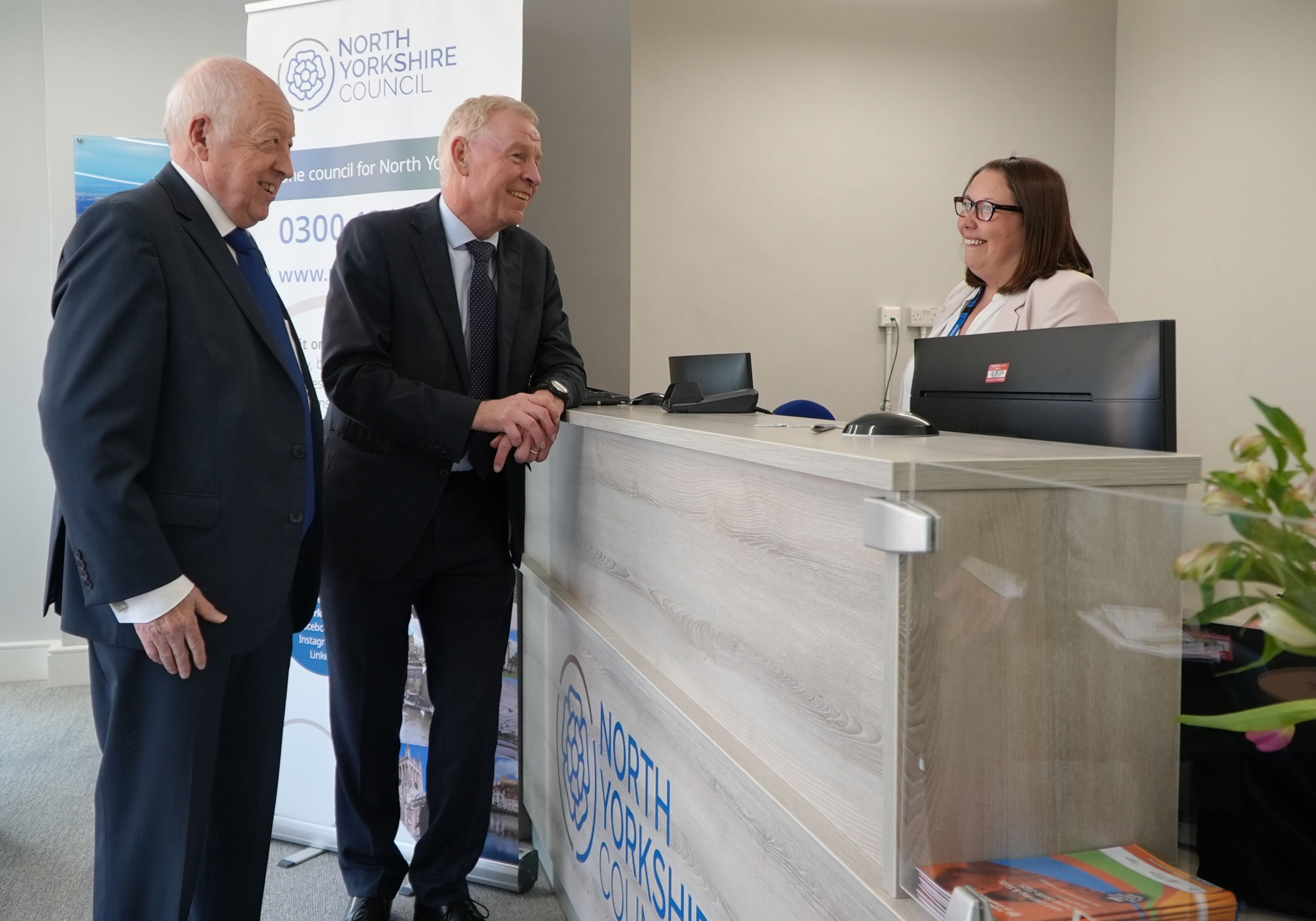 North Yorkshire Council’s leader, Cllr Carl Les, left, and the council’s chief executive, Richard Flinton, speaking to customer services officer Caroline Bellwood, at the reception of the new customer services hub in Northallerton. 