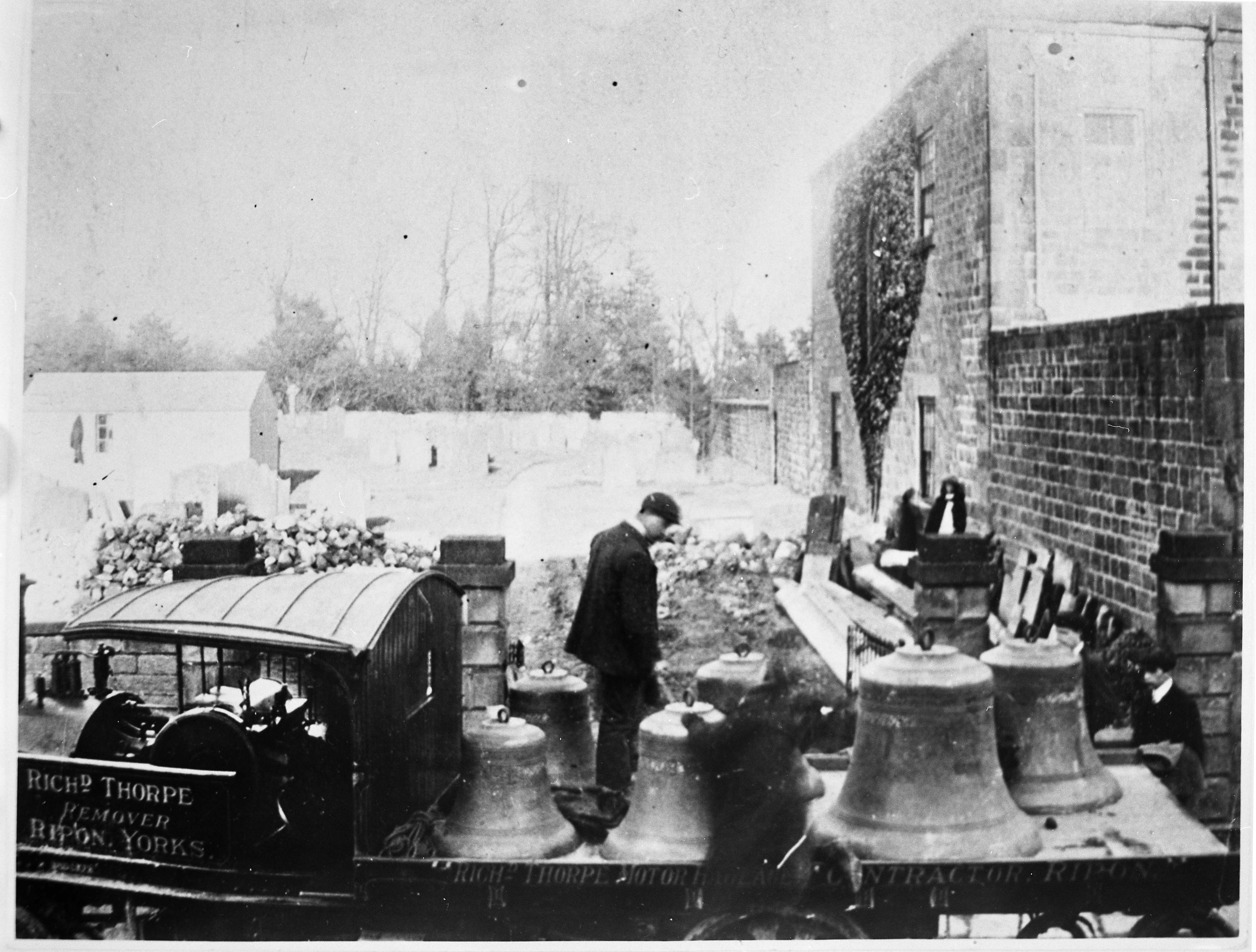 Kirkby Malzeard’s church bells are pictured being returned, following a fire in 1908