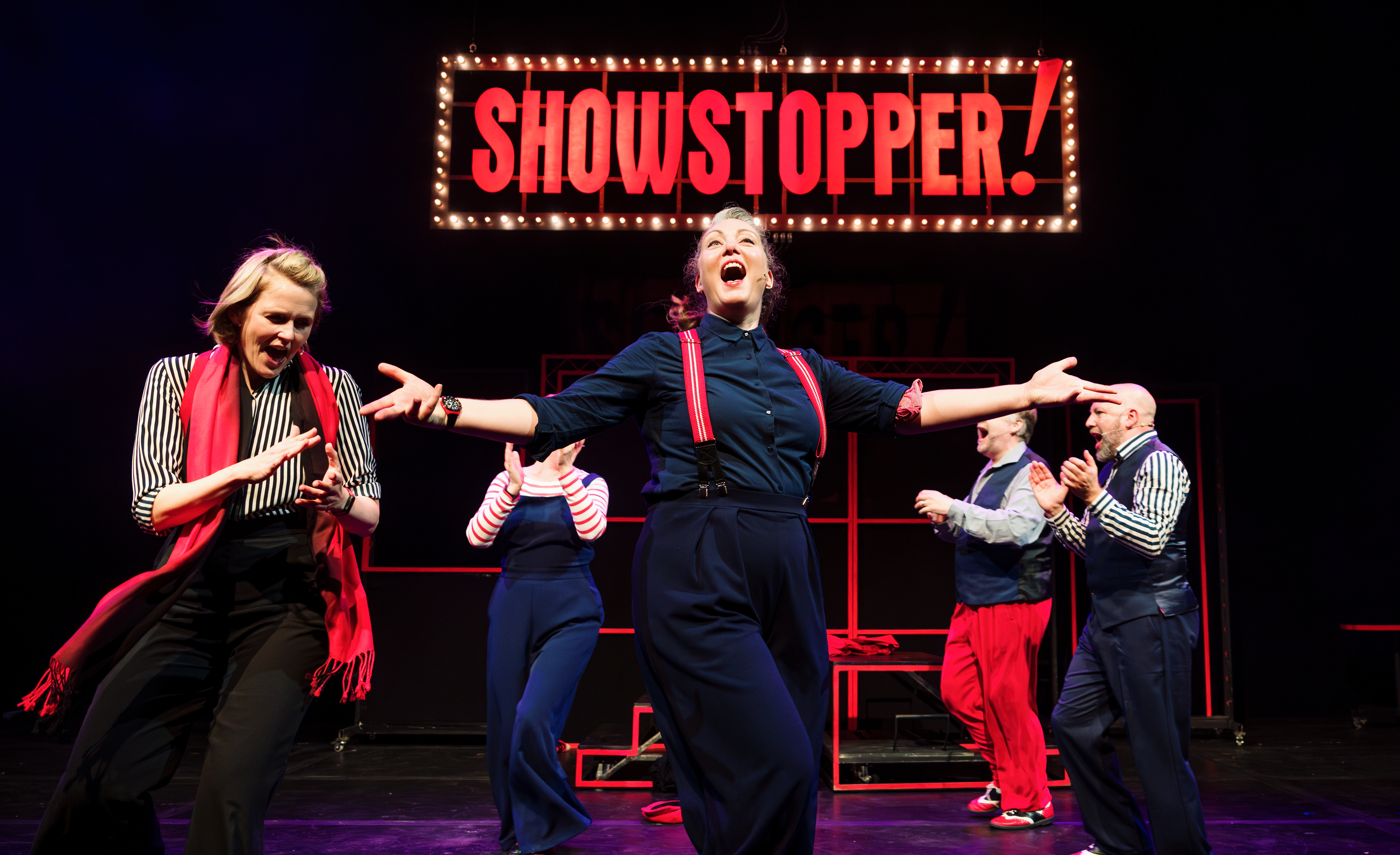 Cast performing the show Showstopper on stage. Copyright Alex Brenner
