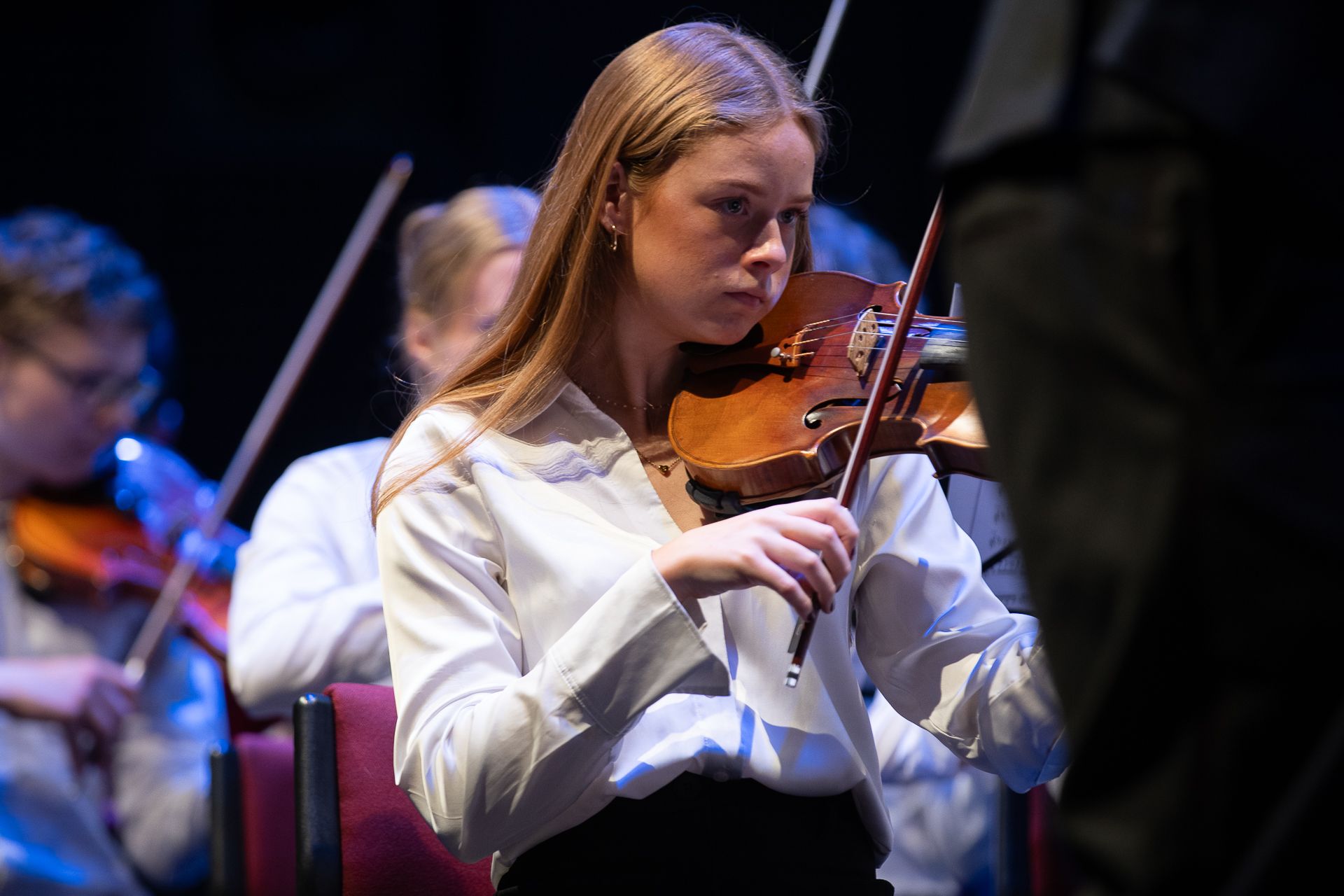 Child playing violin for VE Day celebrations
