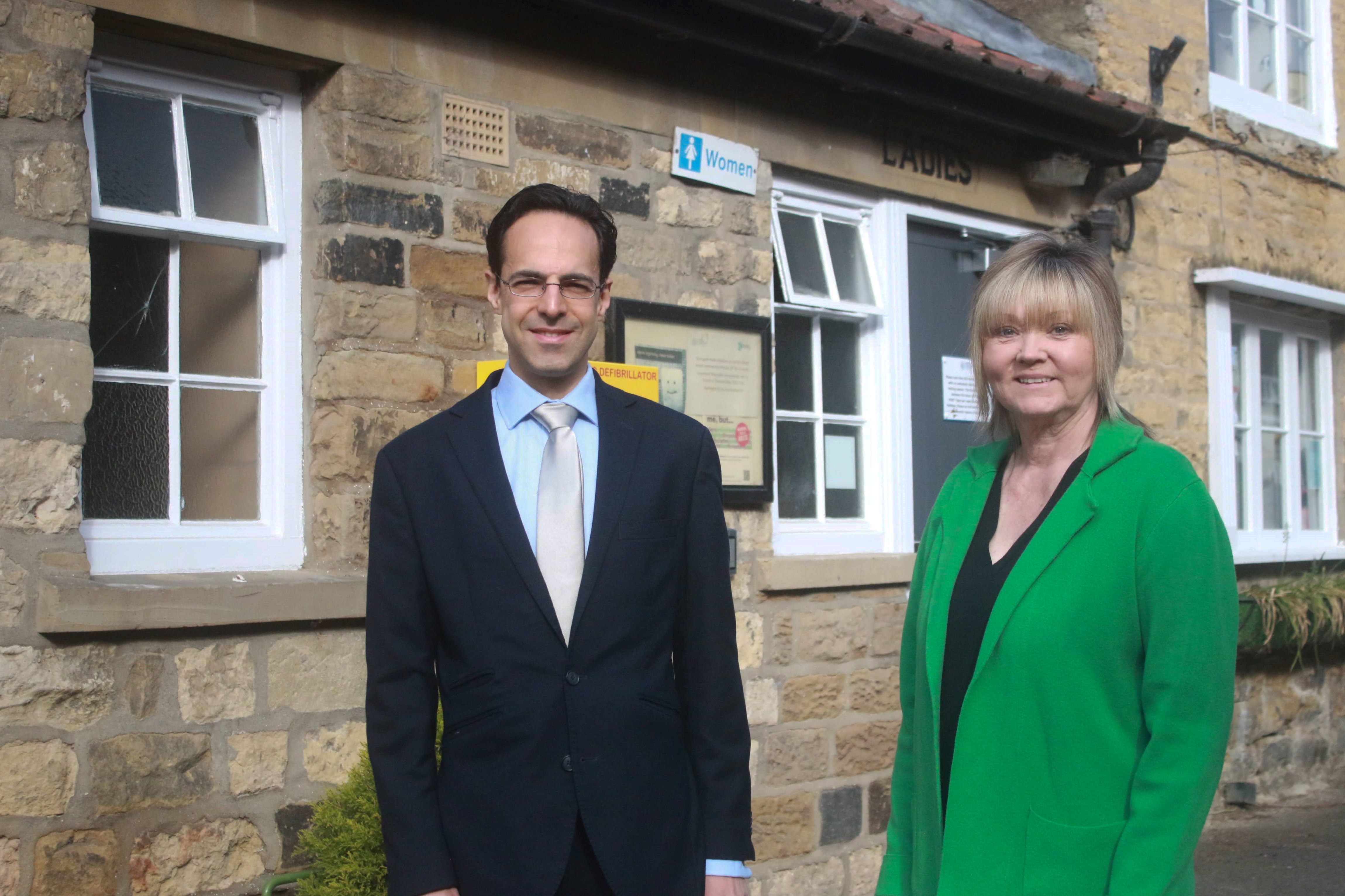 Elected member for the Helmsley and Sinnington division, Cllr George Jabbour, with Cllr Lindsay Burr, the elected member for Malton, outside the newly renovated toilets in Helmsley.
