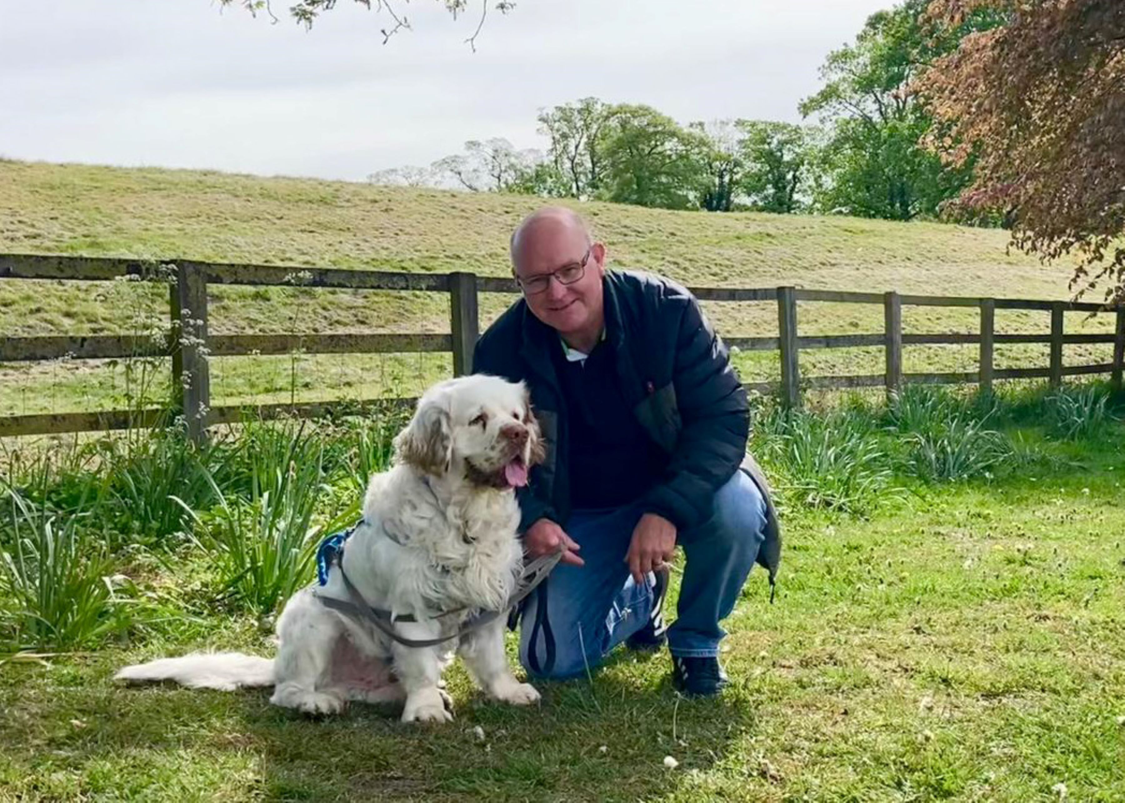 Ian Carman, a volunteer with the independent visitor scheme, and his dog, Morris.