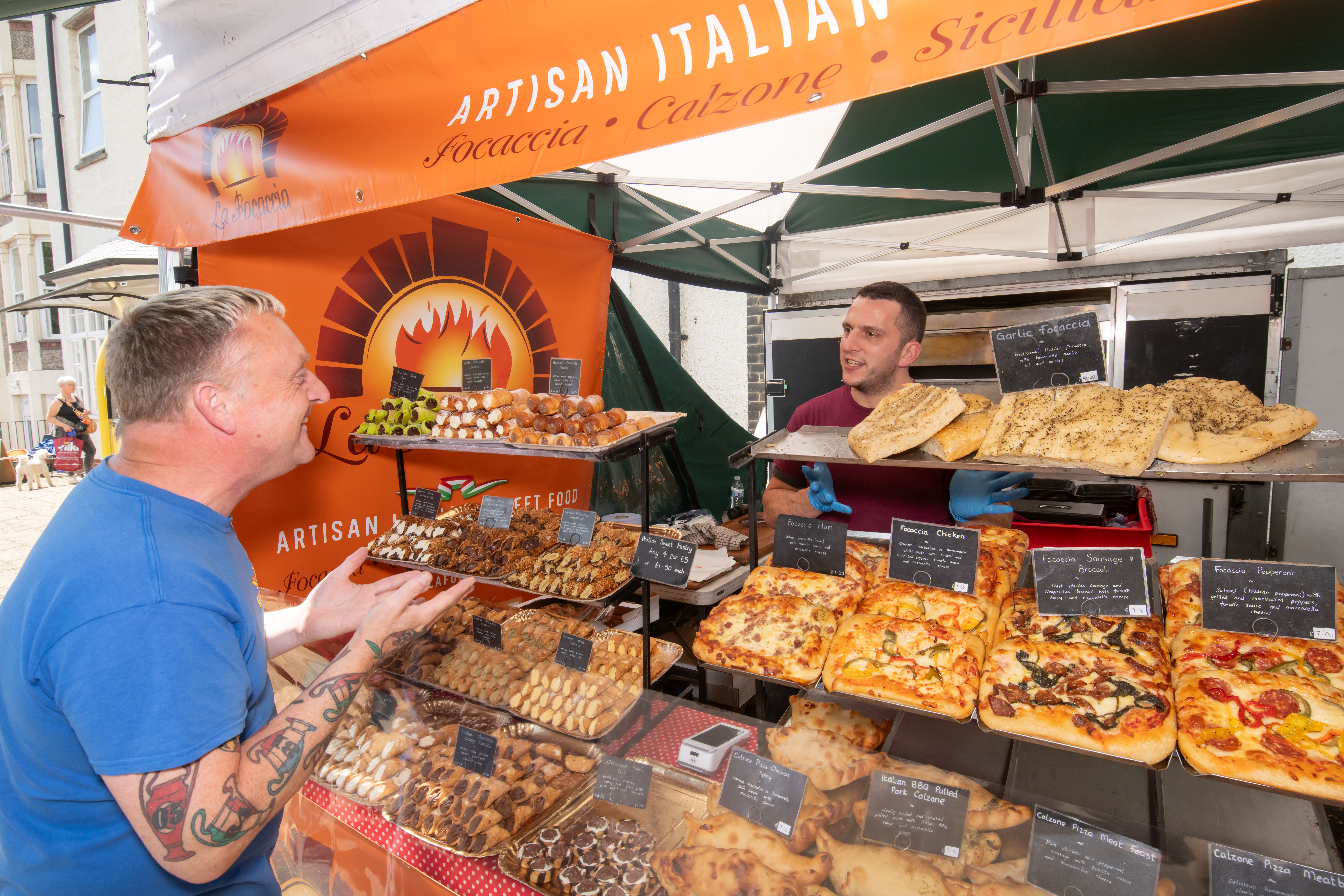 Person being served at the Artisan Italian stall at the Filey Food Festival