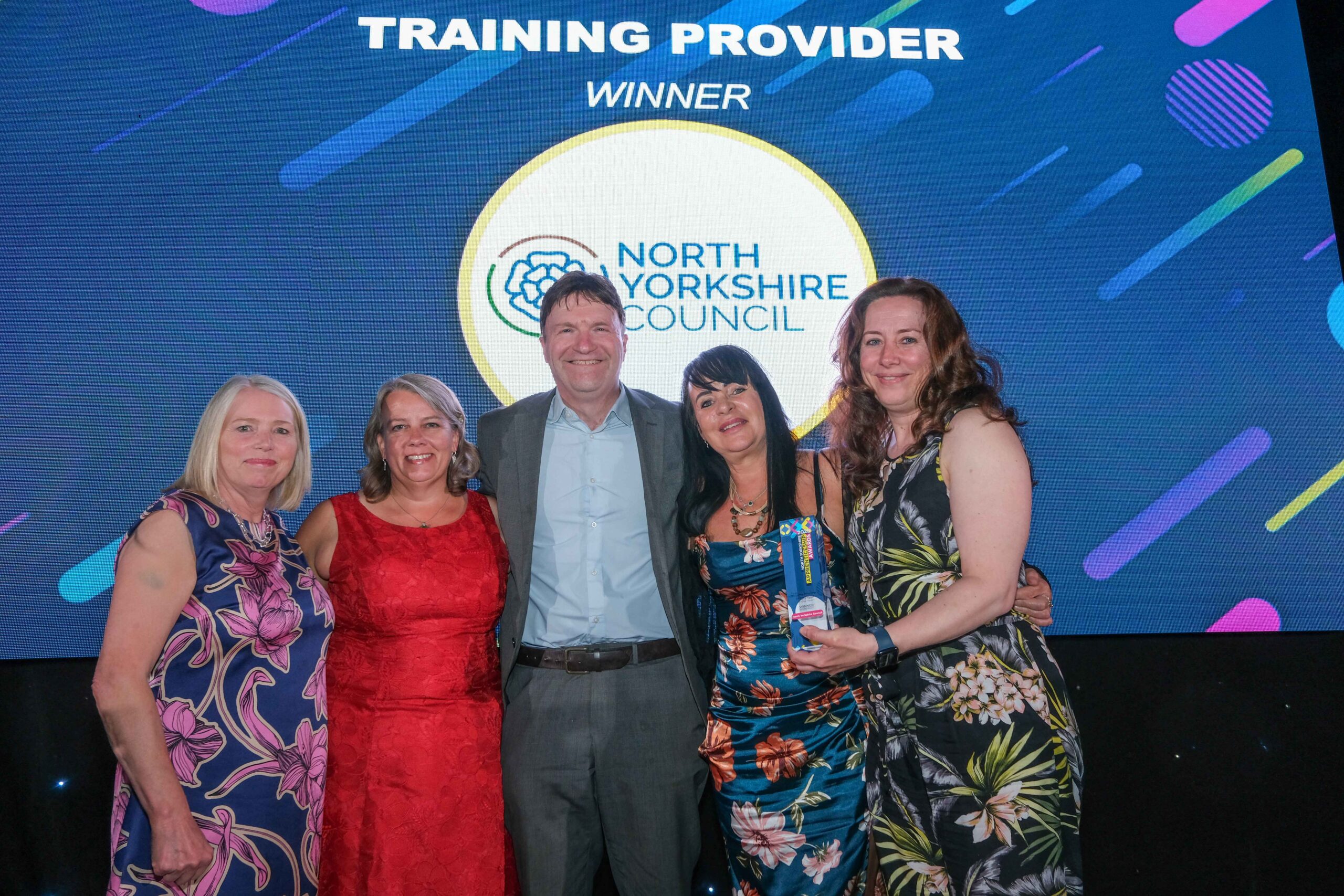 Accepting the training provider of the year award at the North Yorkshire Apprenticeship Awards from The Yorkshire Post’s deputy business editor, Greg White, centre, are, left to right, North Yorkshire Council’s talent management adviser, Pamela McCourt, North Yorkshire Council’s workforce development adviser, Annabel MacGregor, North Yorkshire Council’s lead internal quality assurer, Cath Cooke, and North Yorkshire Council’s training services manager, Wendy Dodsworth. Photo credit: National World.