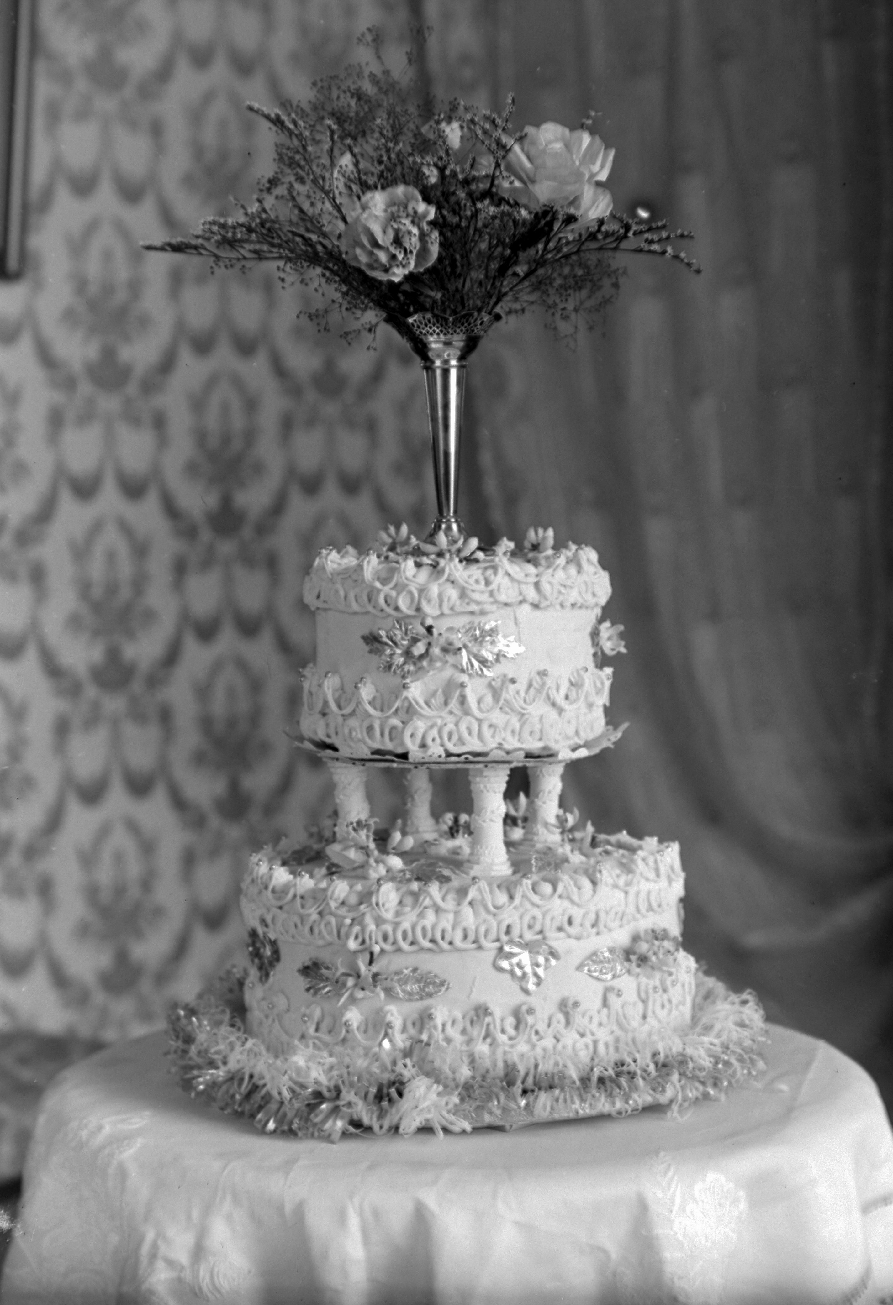 Black and white photo of a Wedding cake in the 1920s. From the Louisa Kruckenberg photographic collection.