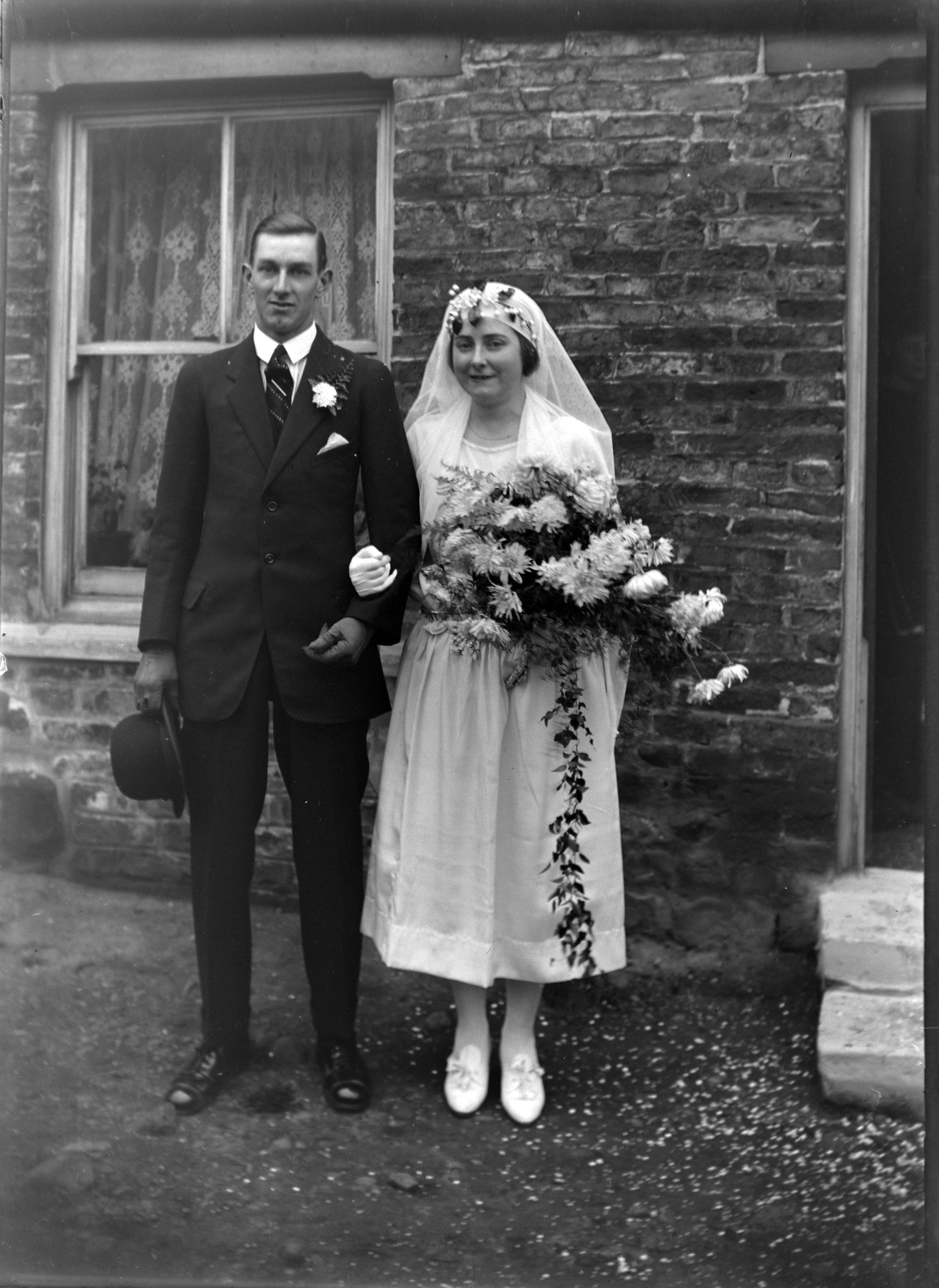 A bride and a groom pictured on their big day in the 1920s. From the Louisa Kruckenberg photographic collection.