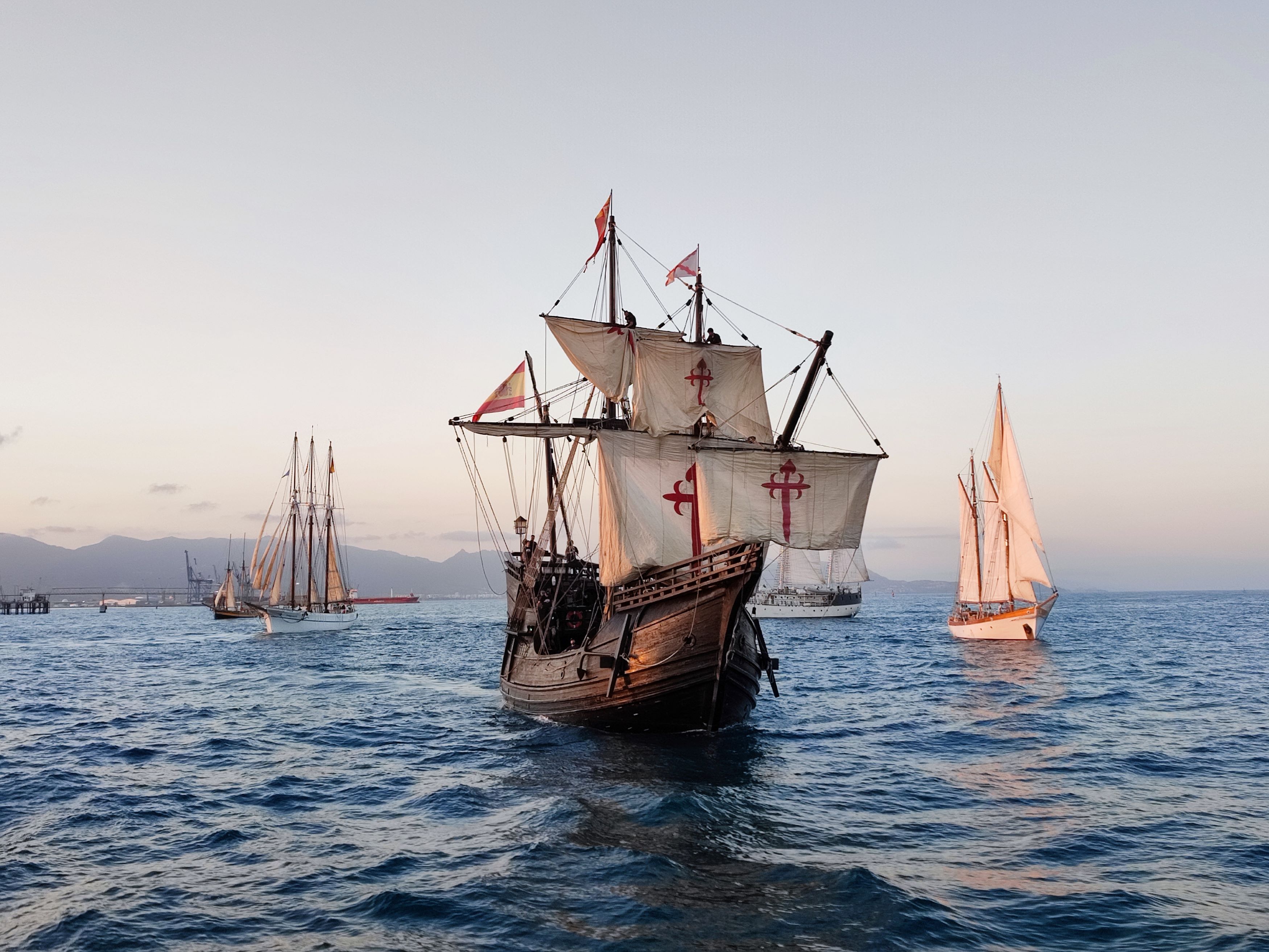 The Nao Victoria in the sea surrounded by other ships